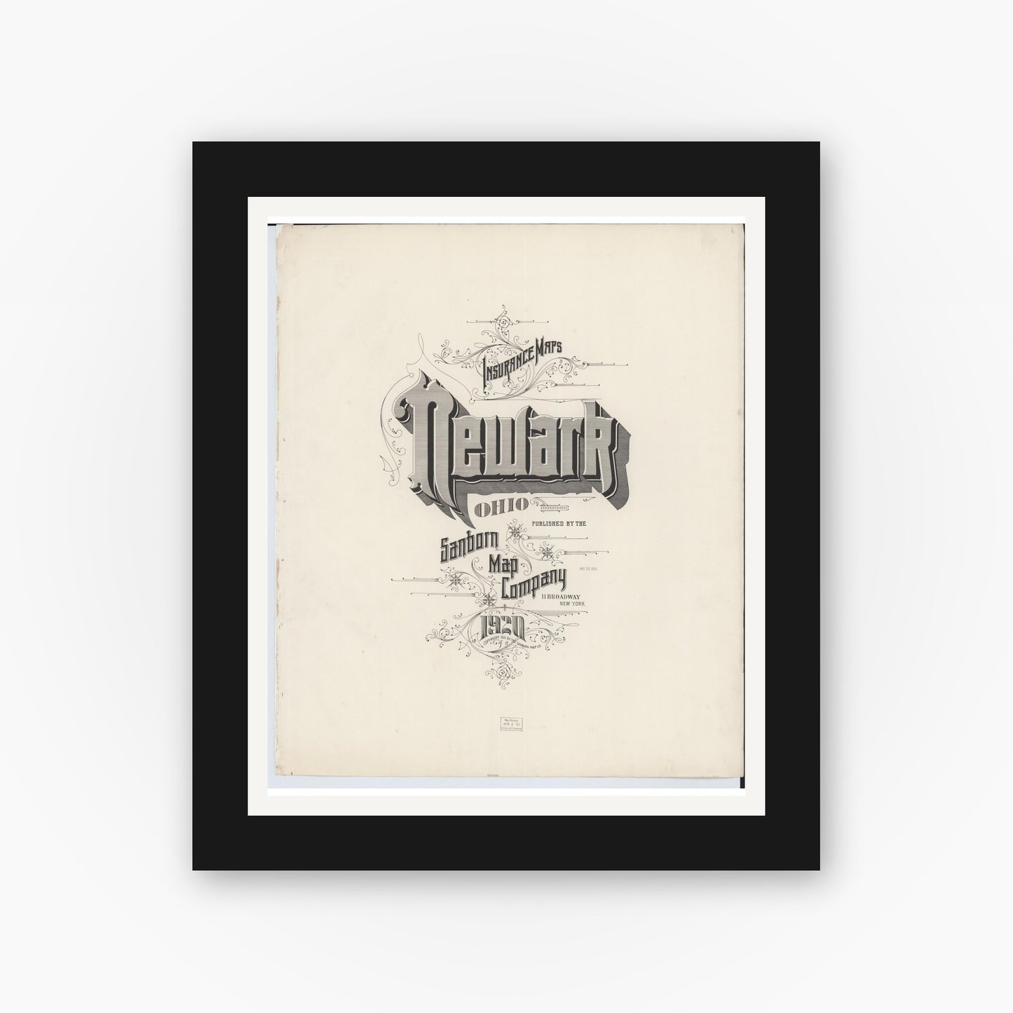 Old map wall art mockup — black gallery frame with white mat — Sanborn Fire Insurance Map from Newark, Licking County, Ohio (1920), Sheet #0001