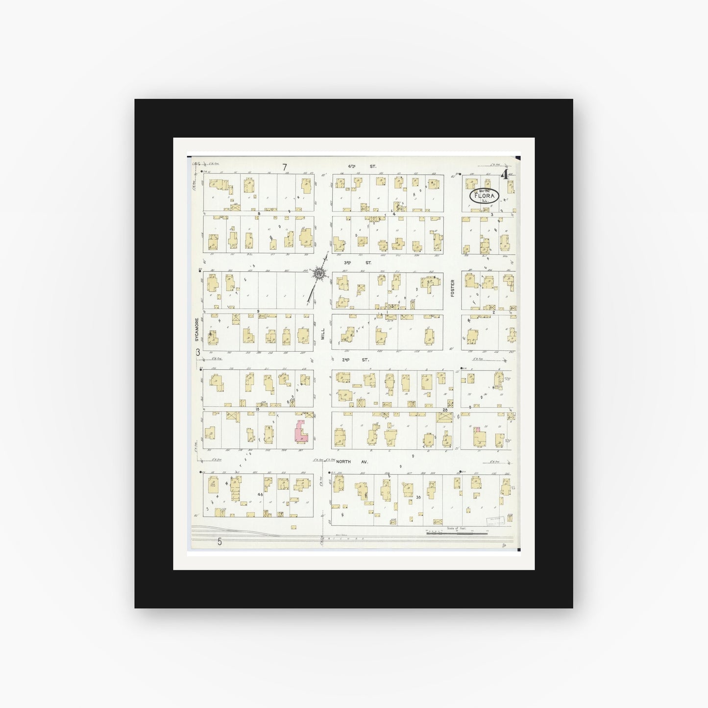 Old map wall art mockup — black gallery frame with white mat — Sanborn Fire Insurance Map from Flora, Clay County, Illinois (1912), Sheet #0004