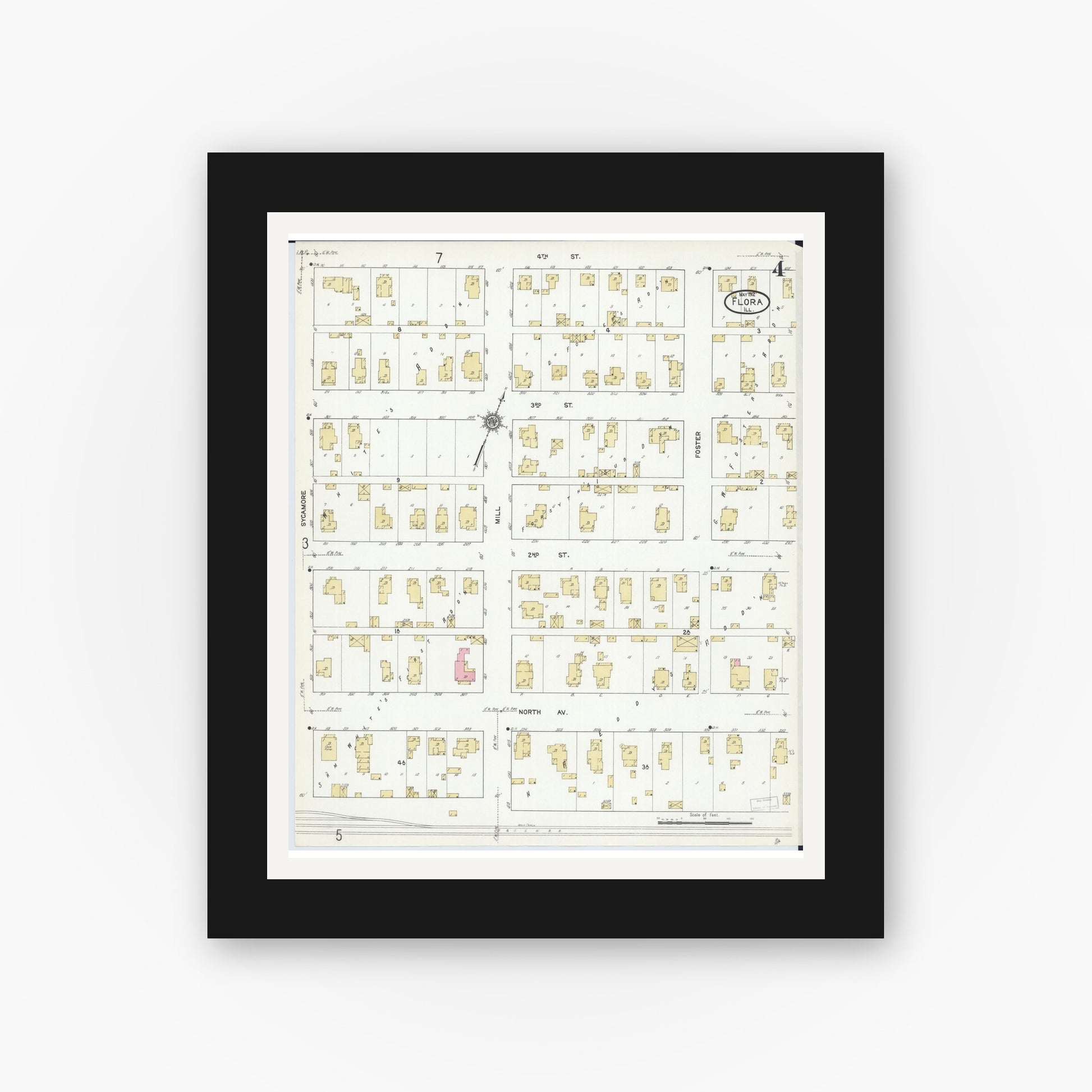 Old map wall art mockup — black gallery frame with white mat — Sanborn Fire Insurance Map from Flora, Clay County, Illinois (1912), Sheet #0004