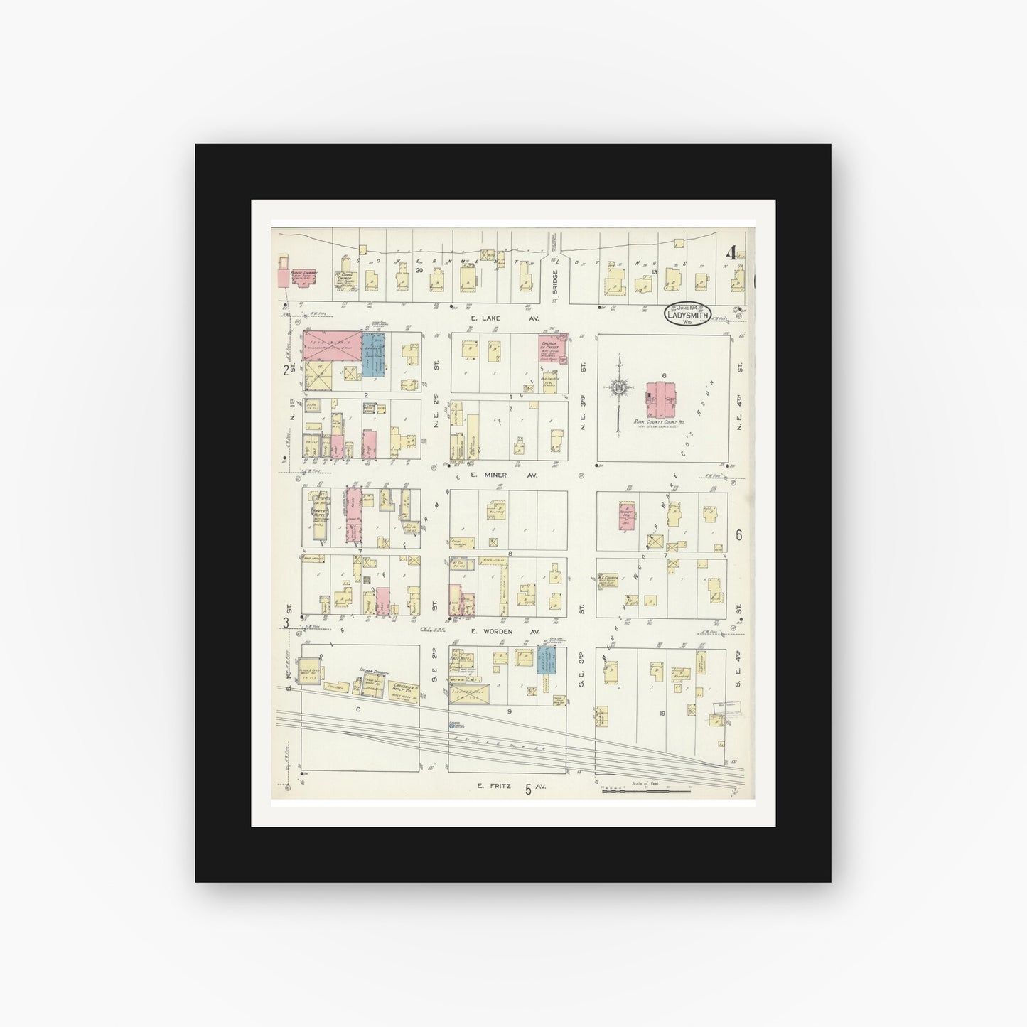 Old map wall art mockup — black gallery frame with white mat — Sanborn Fire Insurance Map from Ladysmith, Rusk County, Wisconsin (1914), Sheet #0004