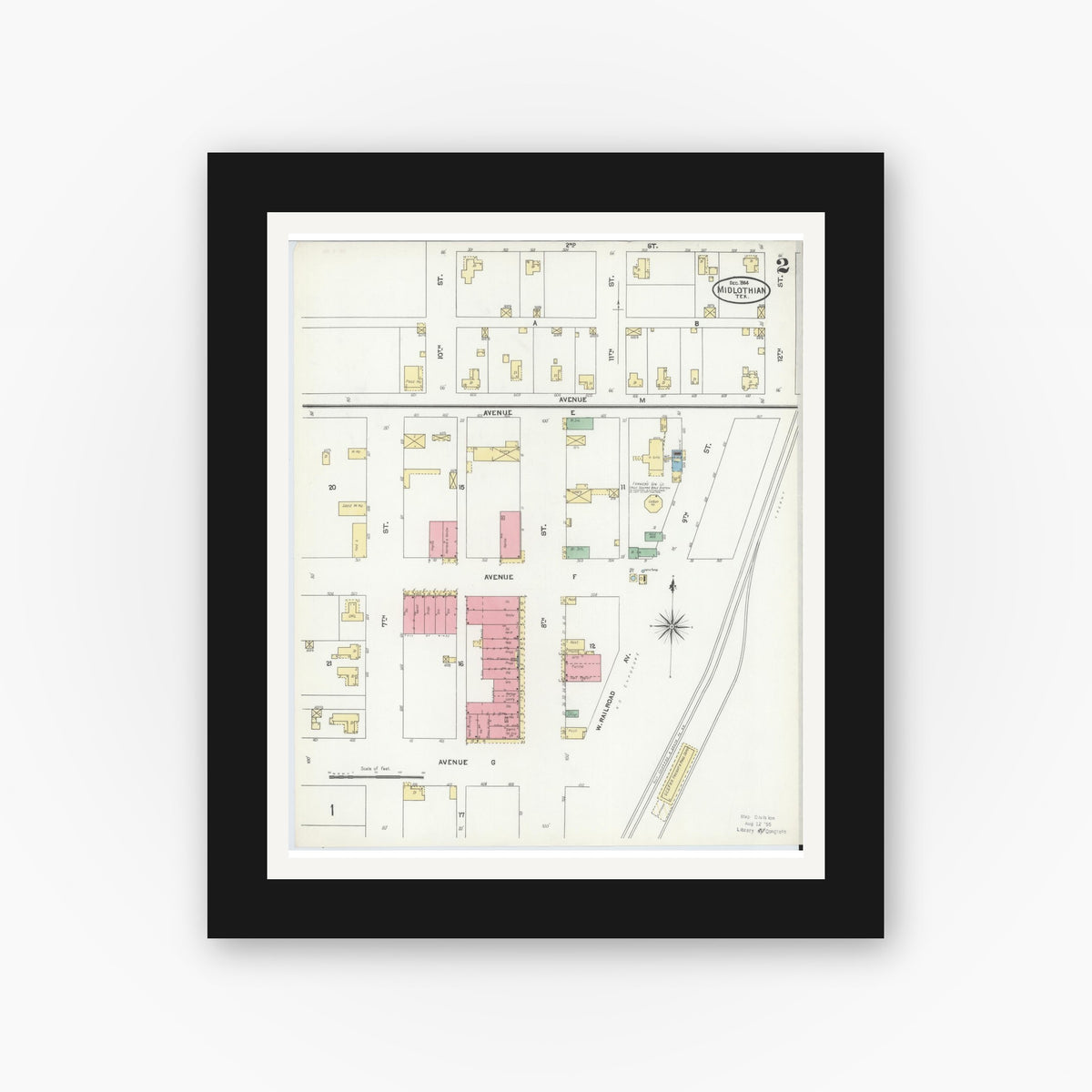 Old map wall art mockup — black gallery frame with white mat — Sanborn Fire Insurance Map from Midlothian, Ellis County, Texas (1904), Sheet #0002