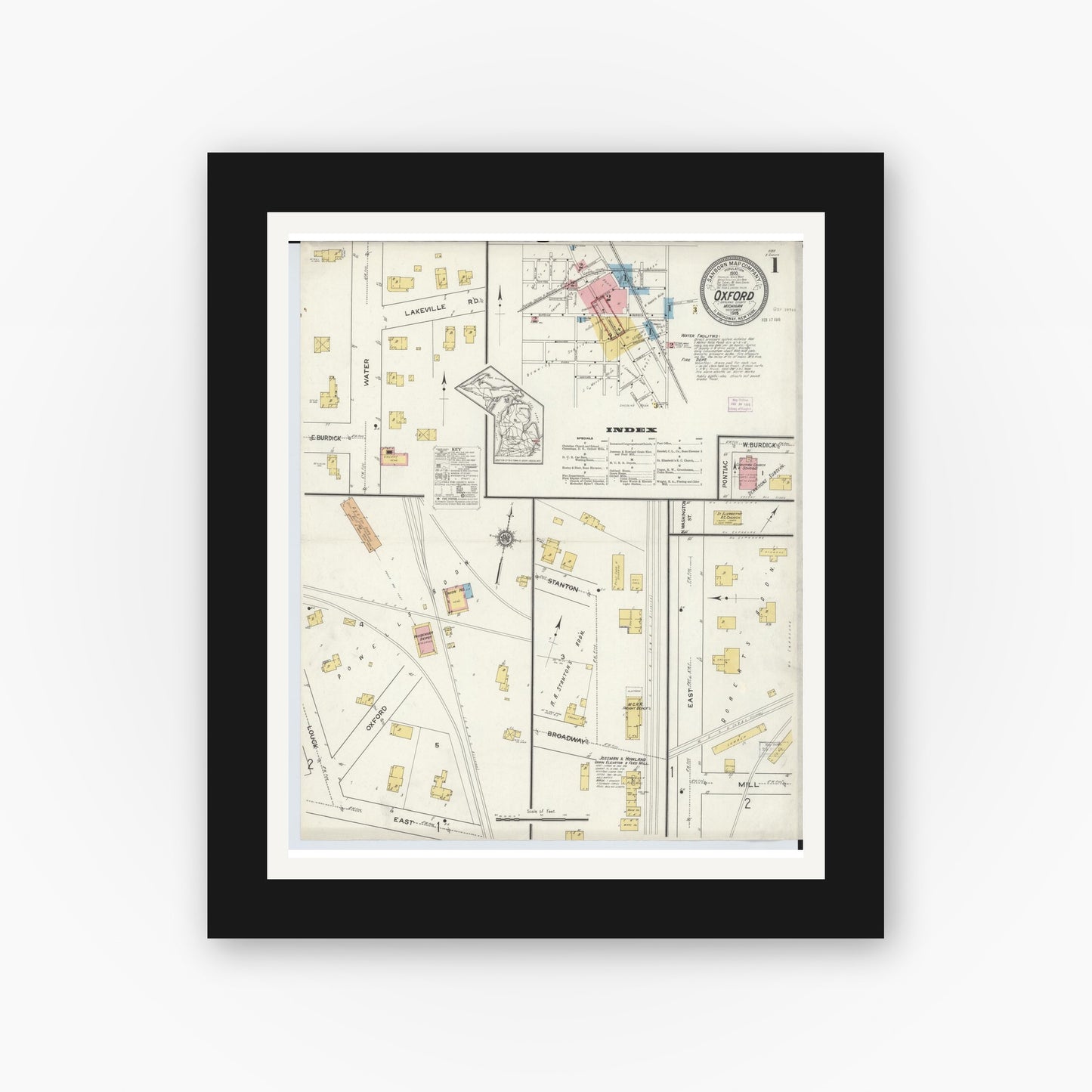 Old map wall art mockup — black gallery frame with white mat — Sanborn Fire Insurance Map from Oxford, Oakland County, Michigan (1915) - Complete Map Set