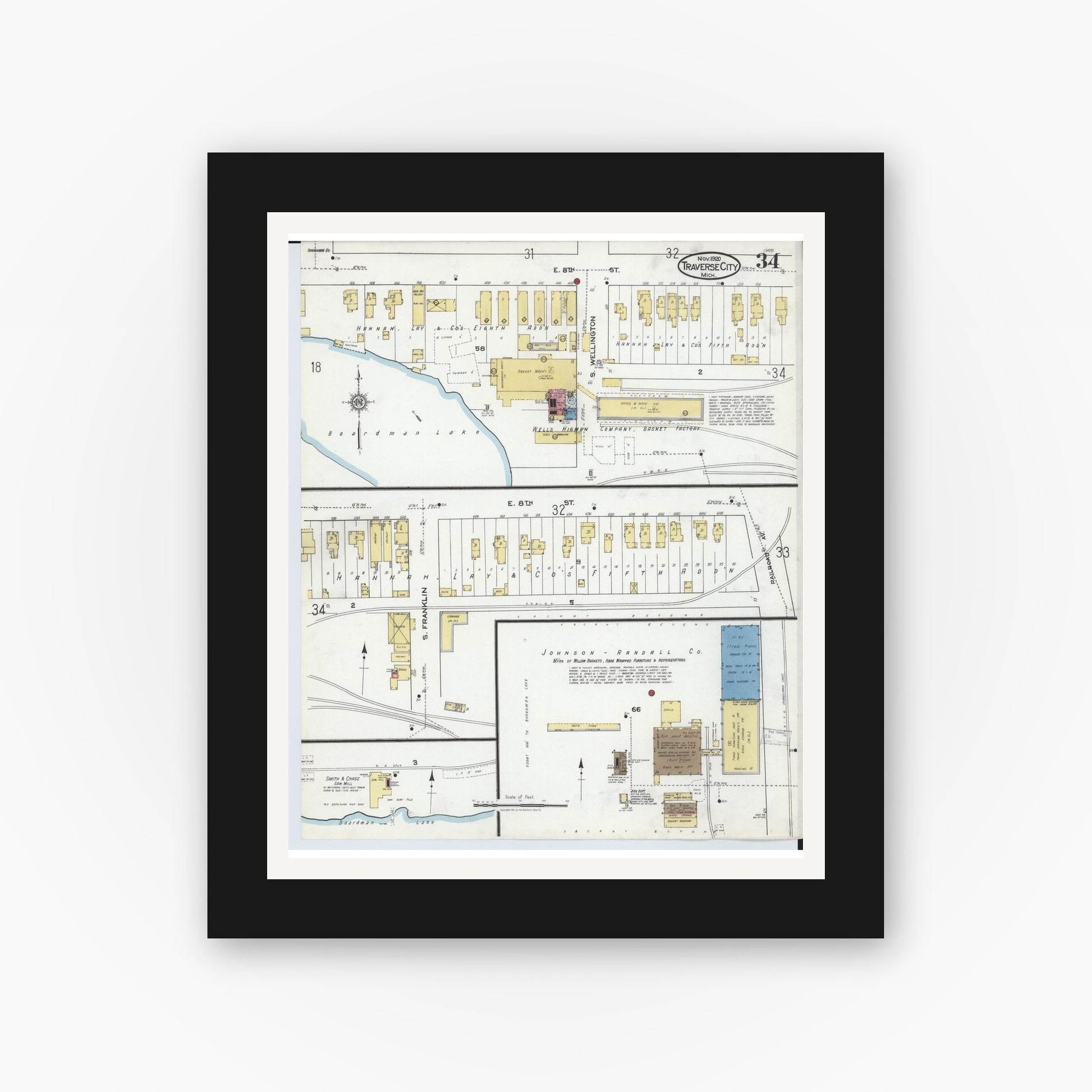 Old map wall art mockup — black gallery frame with white mat — Sanborn Fire Insurance Map from Traverse City, Grand Traverse County, Michigan (1920), Sheet #0034