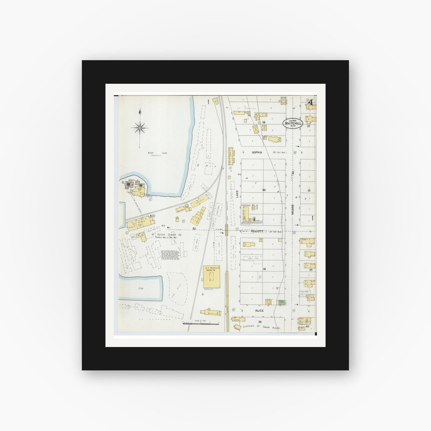 Old map wall art mockup — black gallery frame with white mat — Sanborn Fire Insurance Map from Whitehall, Muskegon County, Michigan (1902), Sheet #0004