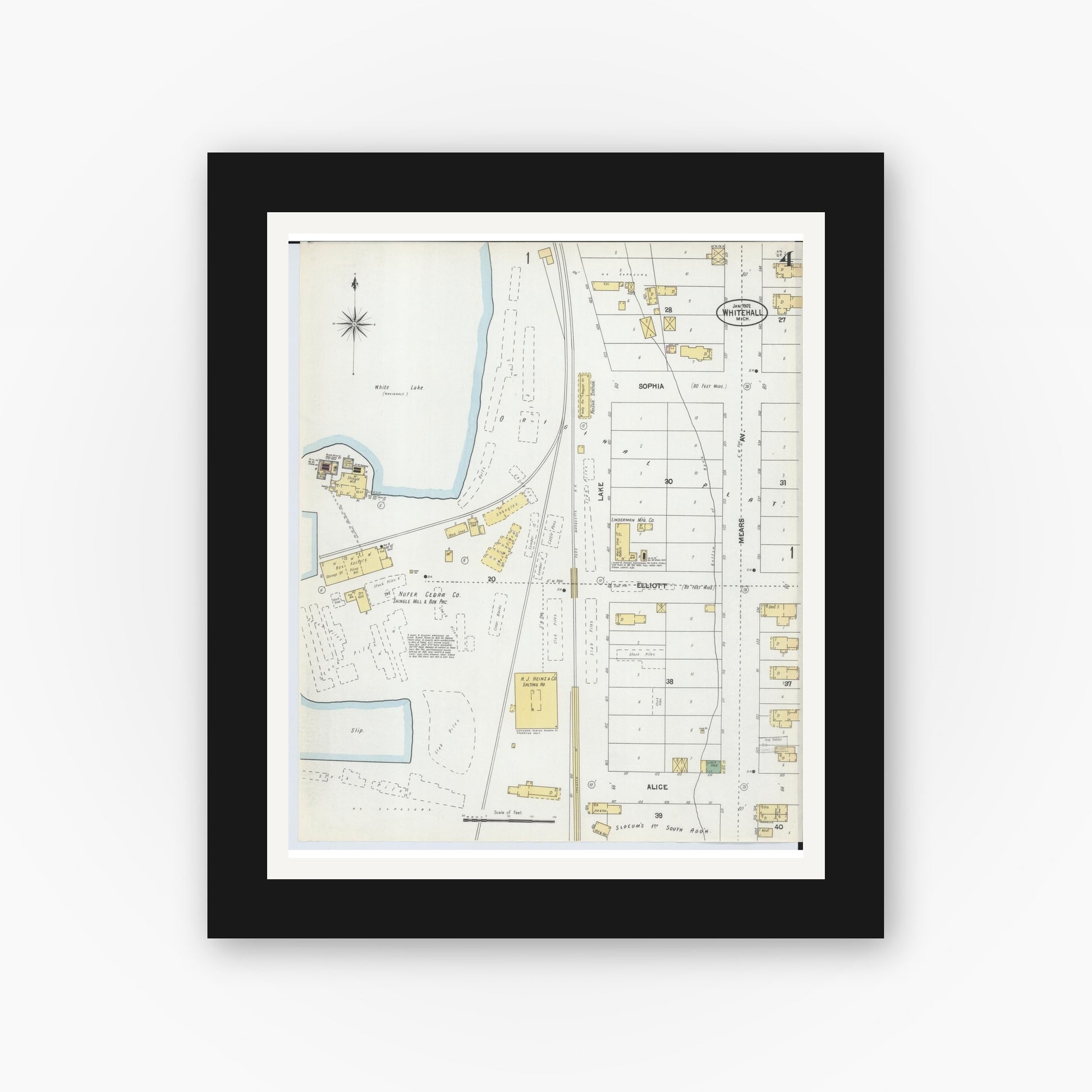 Old map wall art mockup — black gallery frame with white mat — Sanborn Fire Insurance Map from Whitehall, Muskegon County, Michigan (1902), Sheet #0004