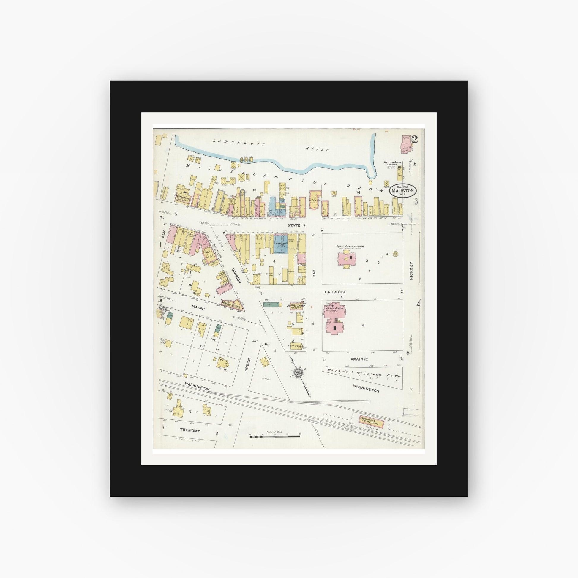 Old map wall art mockup — black gallery frame with white mat — Sanborn Fire Insurance Map from Mauston, Juneau County, Wisconsin (1909), Sheet #0002