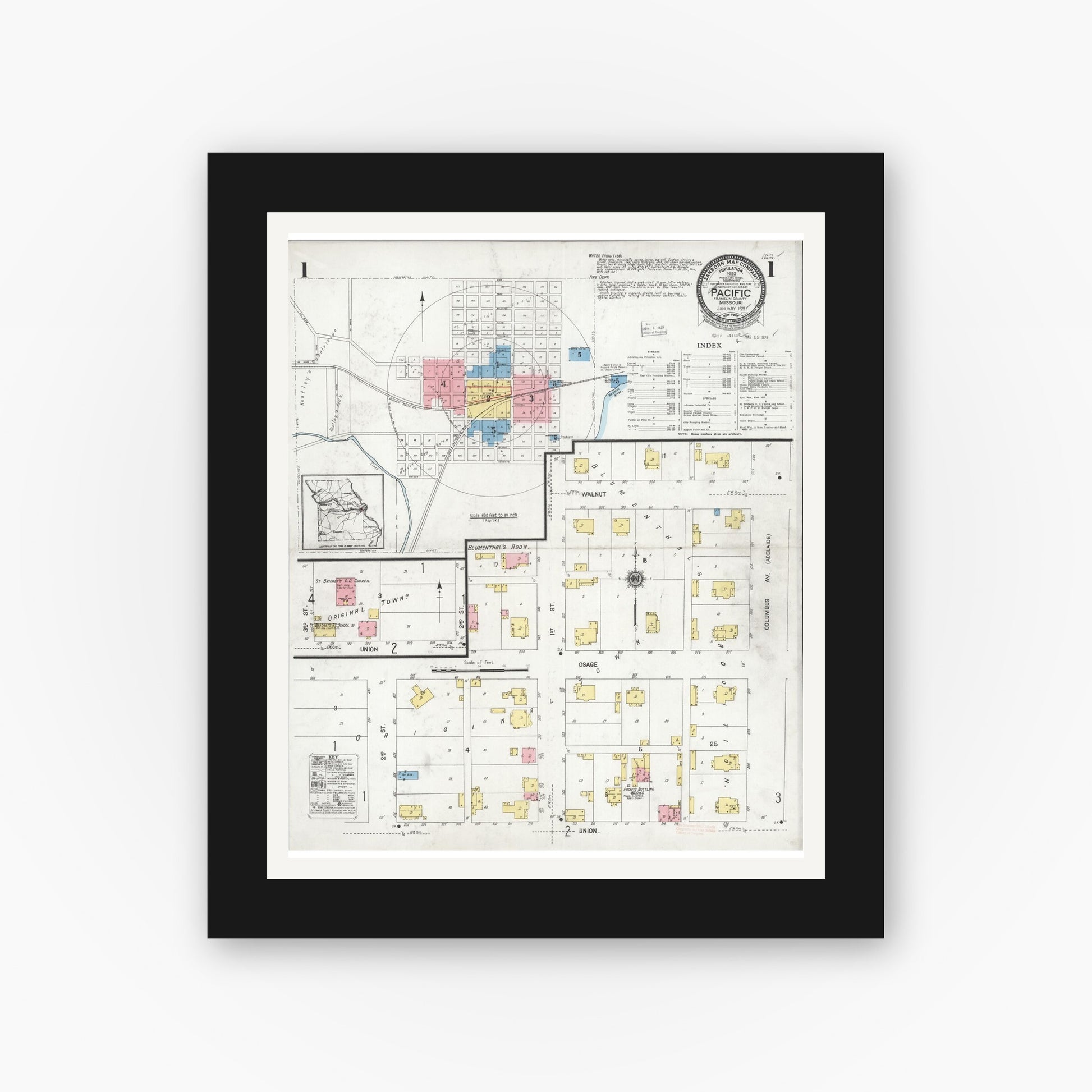Old map wall art mockup — black gallery frame with white mat — Sanborn Fire Insurance Map from Pacific, Franklin County, Missouri (1929), Sheet #0001