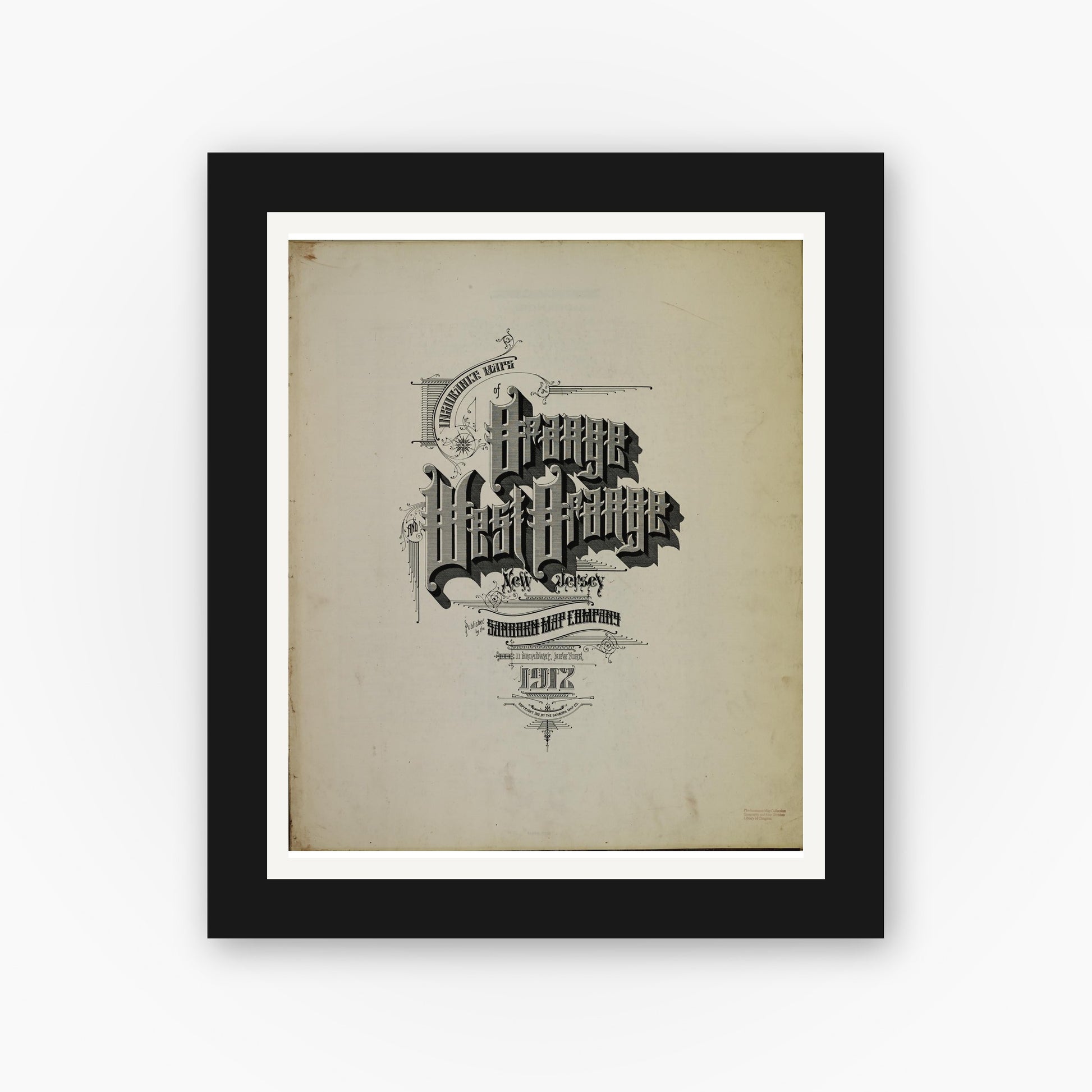 Old map wall art mockup — black gallery frame with white mat — Sanborn Fire Insurance Map from Orange, Essex County, New Jersey (1912), Sheet #0001