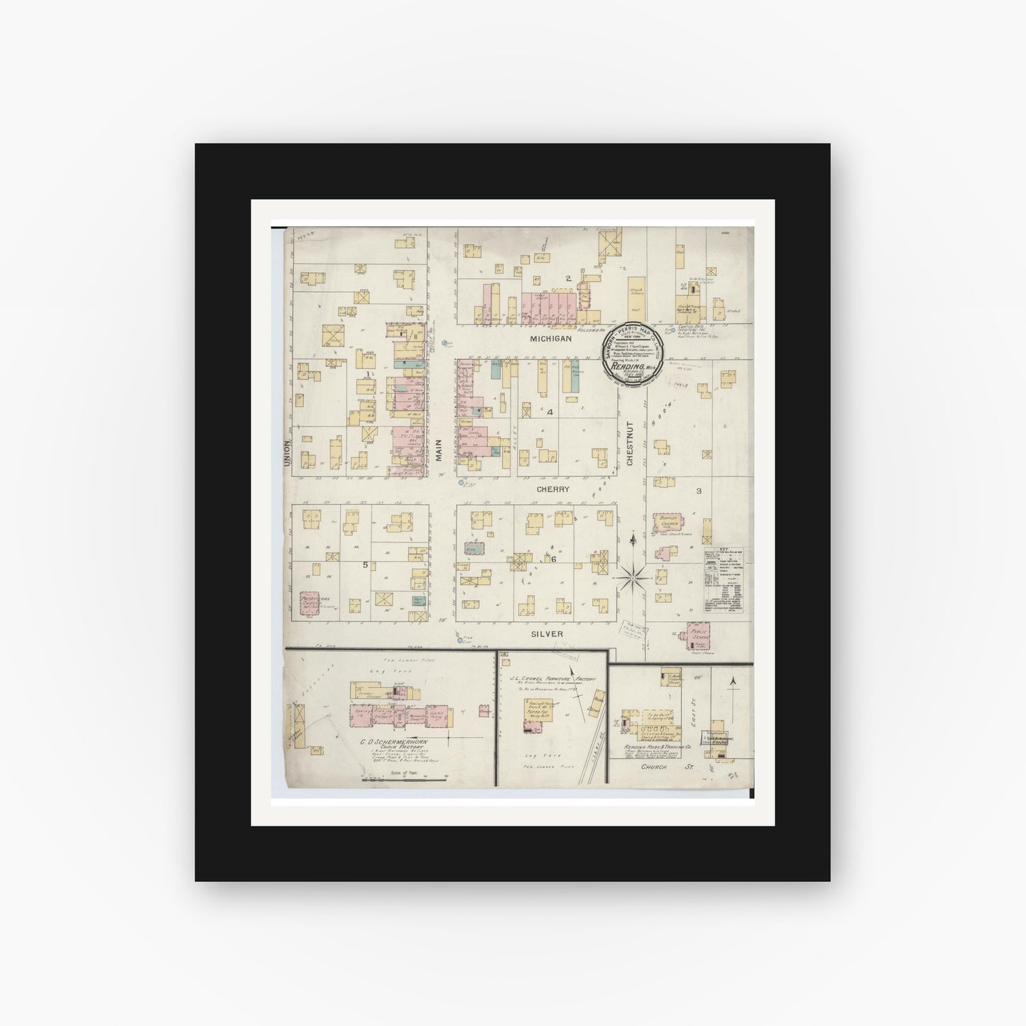 Old map wall art mockup — black gallery frame with white mat — Sanborn Fire Insurance Map from Reading, Hillsdale County, Michigan (1893), Sheet #0001