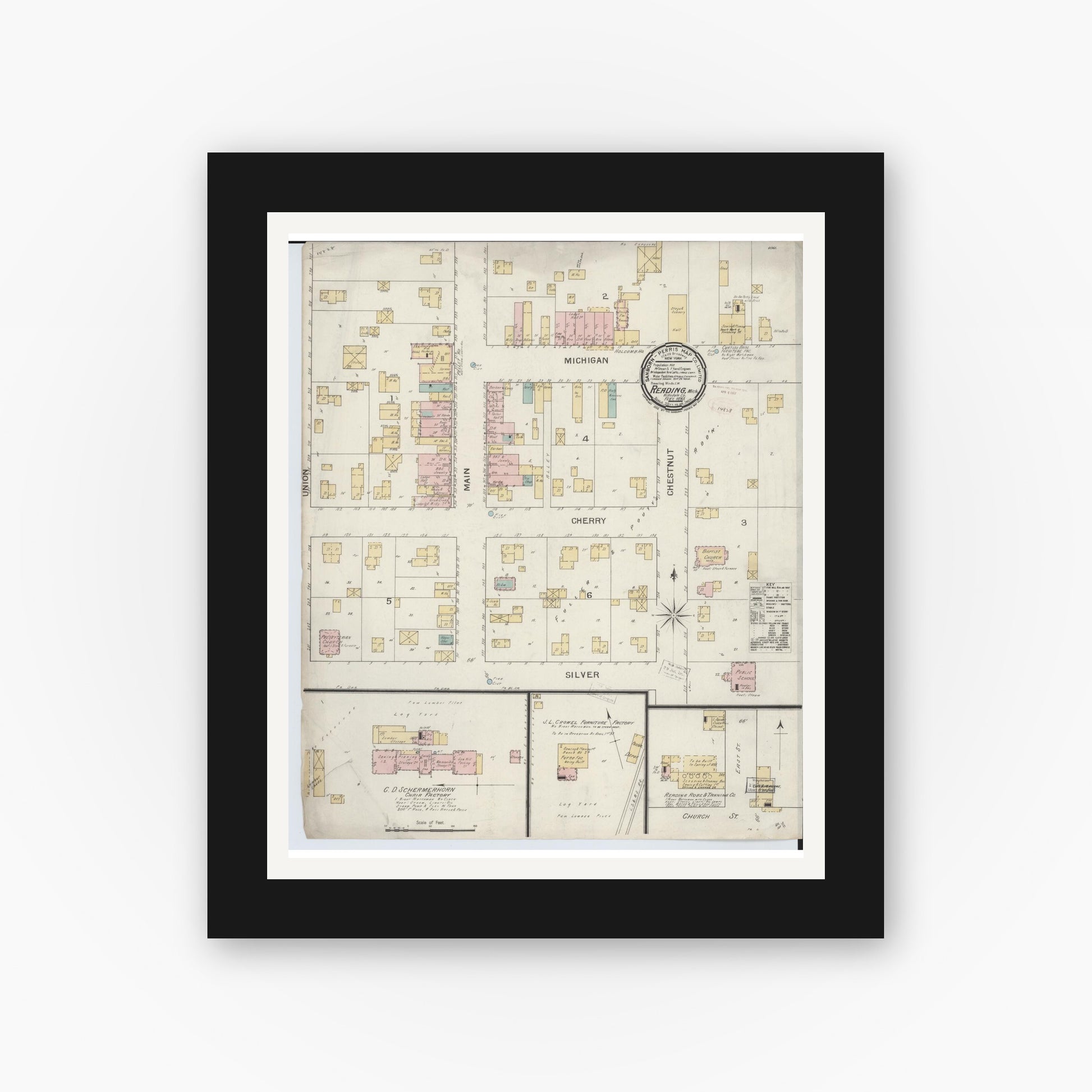 Old map wall art mockup — black gallery frame with white mat — Sanborn Fire Insurance Map from Reading, Hillsdale County, Michigan (1893), Sheet #0001