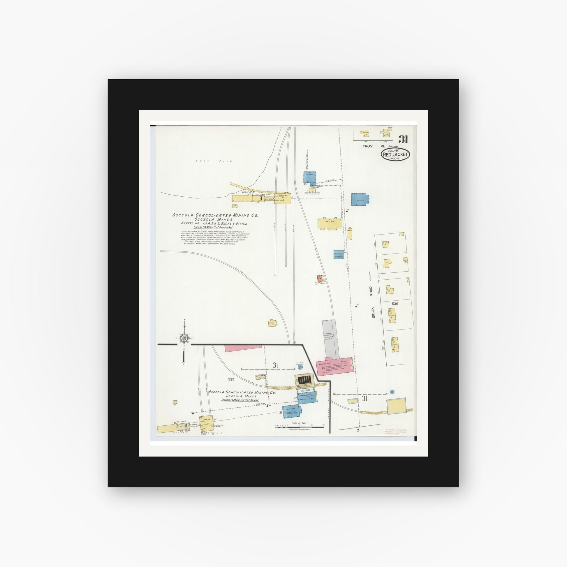 Old map wall art mockup — black gallery frame with white mat — Sanborn Fire Insurance Map from Red Jacket, Houghton County, Michigan (1917), Sheet #0031