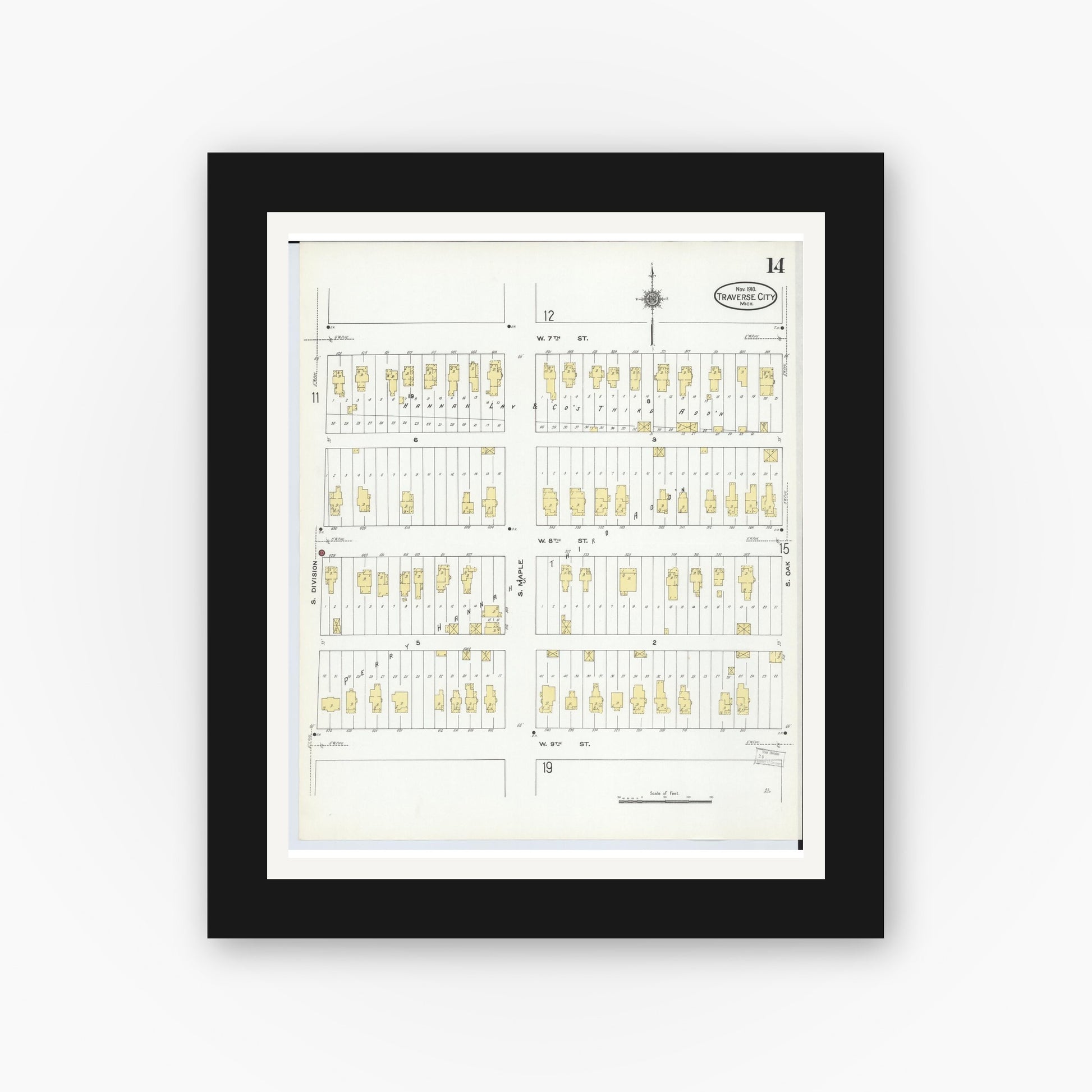Old map wall art mockup — black gallery frame with white mat — Sanborn Fire Insurance Map from Traverse City, Grand Traverse County, Michigan (1910), Sheet #0014