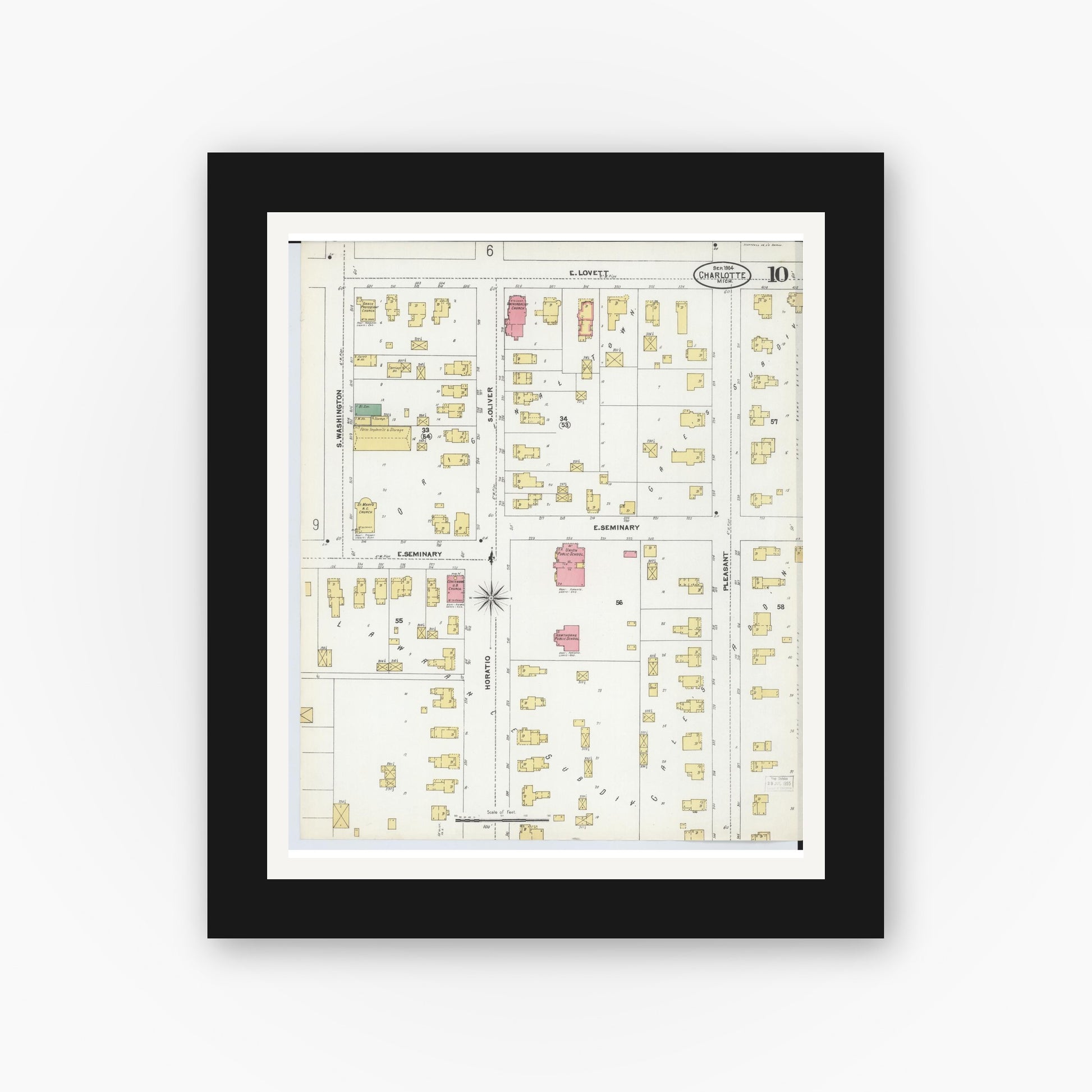 Old map wall art mockup — black gallery frame with white mat — Sanborn Fire Insurance Map from Charlotte, Eaton County, Michigan (1904), Sheet #0010