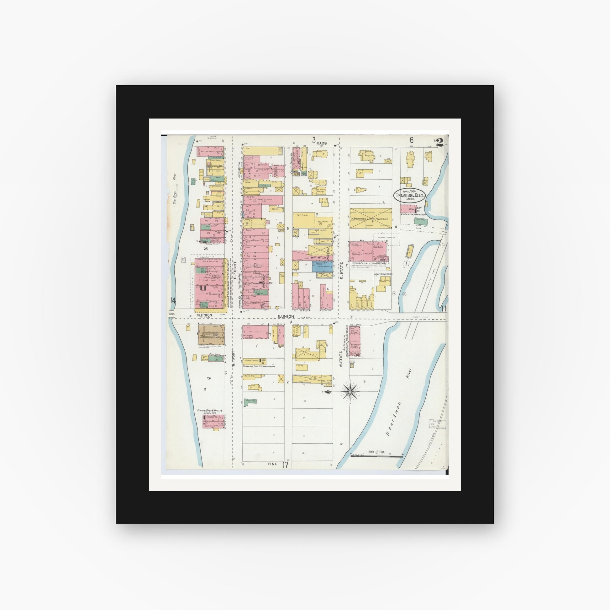 Old map wall art mockup — black gallery frame with white mat — Sanborn Fire Insurance Map from Traverse City, Grand Traverse County, Michigan (1904), Sheet #0002