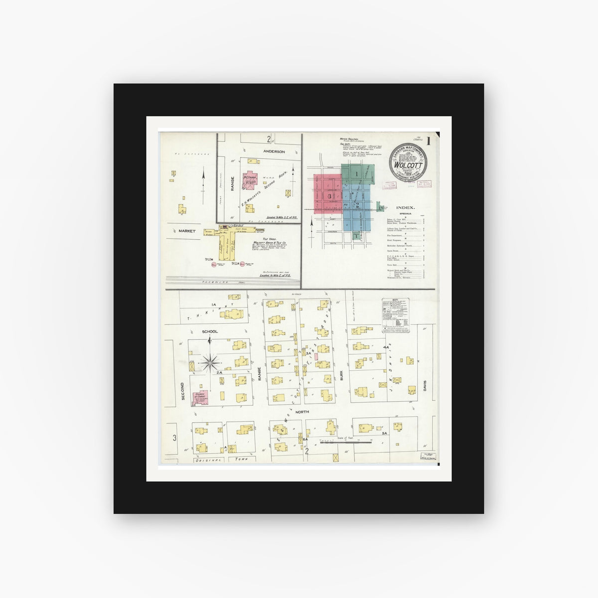 Old map wall art mockup — black gallery frame with white mat — Sanborn Fire Insurance Map from Wolcott, White County, Indiana (1909), Sheet #0001