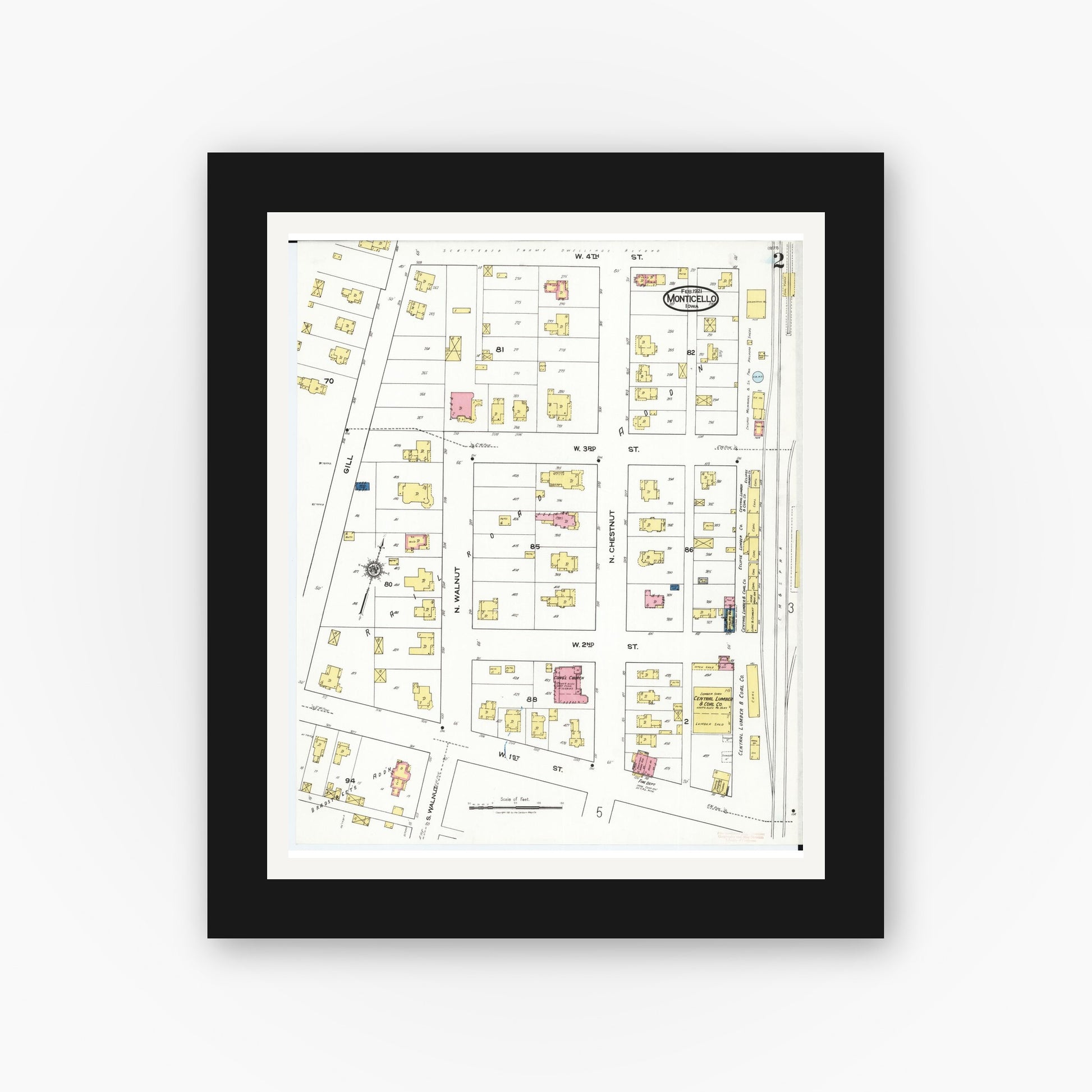 Old map wall art mockup — black gallery frame with white mat — Sanborn Fire Insurance Map from Monticello, Jones County, Iowa (1921), Sheet #0002