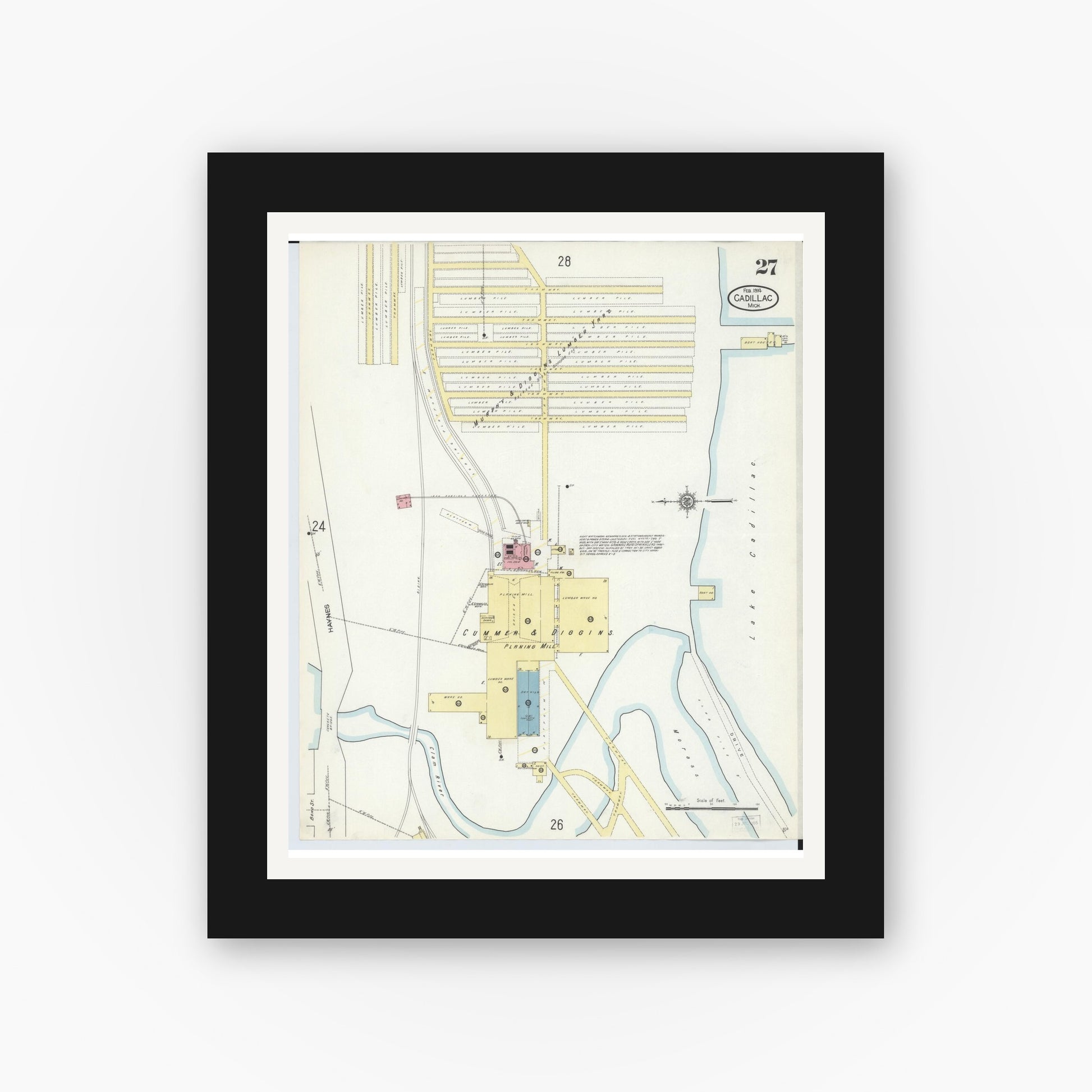 Old map wall art mockup — black gallery frame with white mat — Sanborn Fire Insurance Map from Cadillac, Wexford County, Michigan (1914), Sheet #0027
