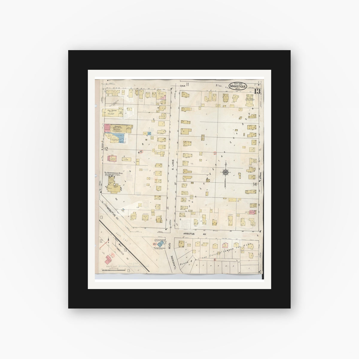 Old map wall art mockup — black gallery frame with white mat — Sanborn Fire Insurance Map from Manistique, Schoolcraft County, Michigan (1950), Sheet #0013