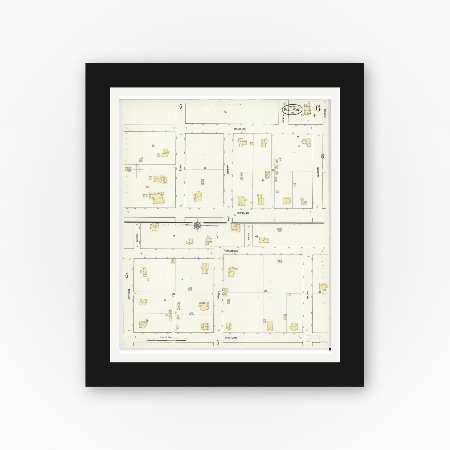 Old map wall art mockup — black gallery frame with white mat — Sanborn Fire Insurance Map from Pilot Point, Denton County, Texas (1912), Sheet #0006