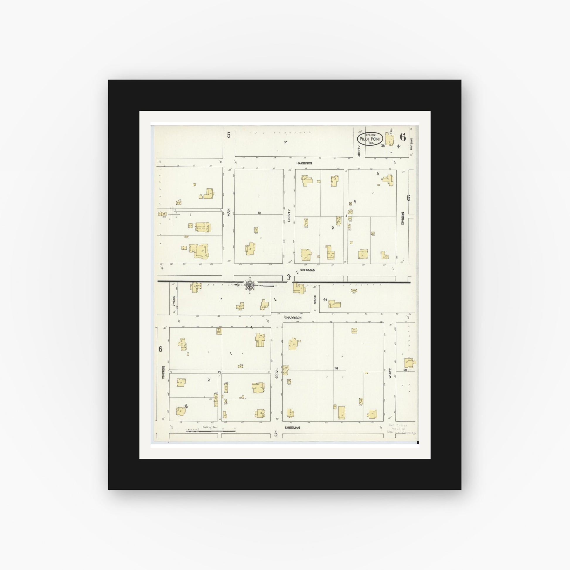 Old map wall art mockup — black gallery frame with white mat — Sanborn Fire Insurance Map from Pilot Point, Denton County, Texas (1912), Sheet #0006