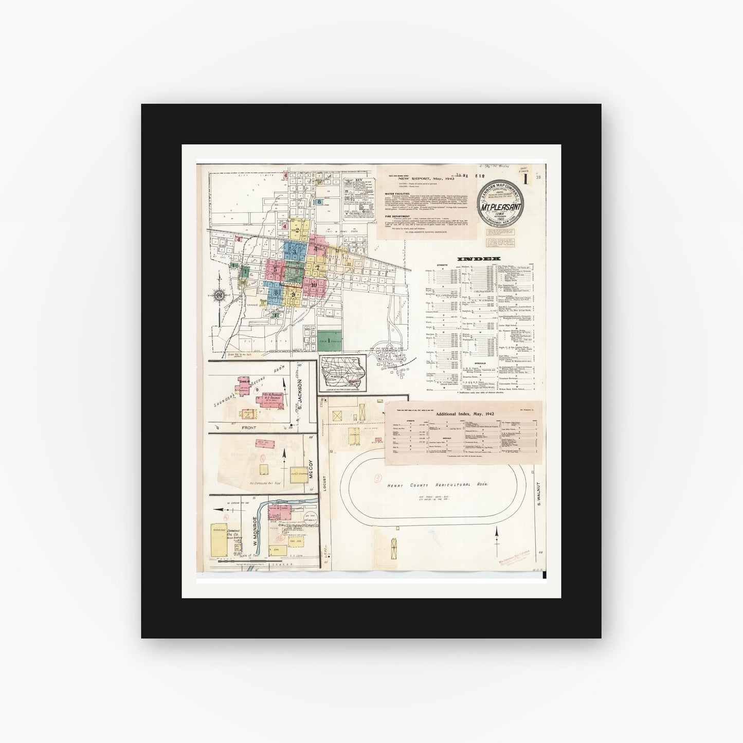 Old map wall art mockup — black gallery frame with white mat — Sanborn Fire Insurance Map from Mount Pleasant, Henry County, Iowa (1942), Sheet #0001