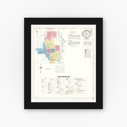 Old map wall art mockup — black gallery frame with white mat — Sanborn Fire Insurance Map from Monticello, Jones County, Iowa (1943) â€” Complete Set