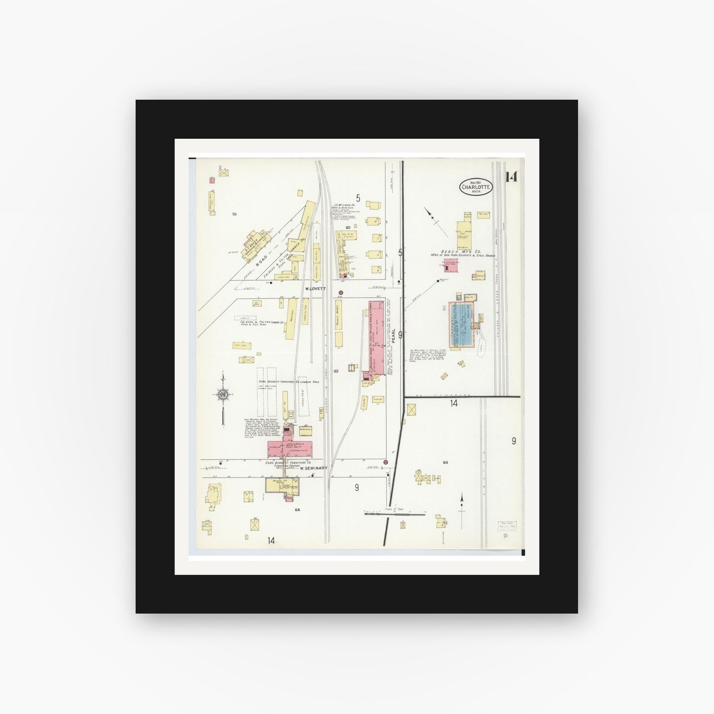 Old map wall art mockup — black gallery frame with white mat — Sanborn Fire Insurance Map from Charlotte, Eaton County, Michigan (1911), Sheet #0014