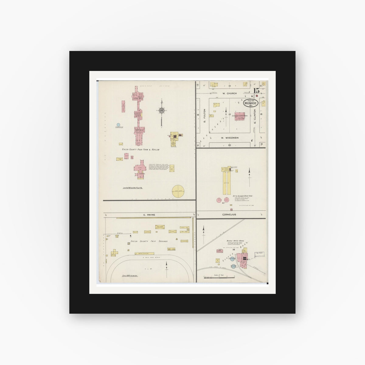 Old map wall art mockup — black gallery frame with white mat — Sanborn Fire Insurance Map from Monroe, Green County, Wisconsin (1915), Sheet #0015