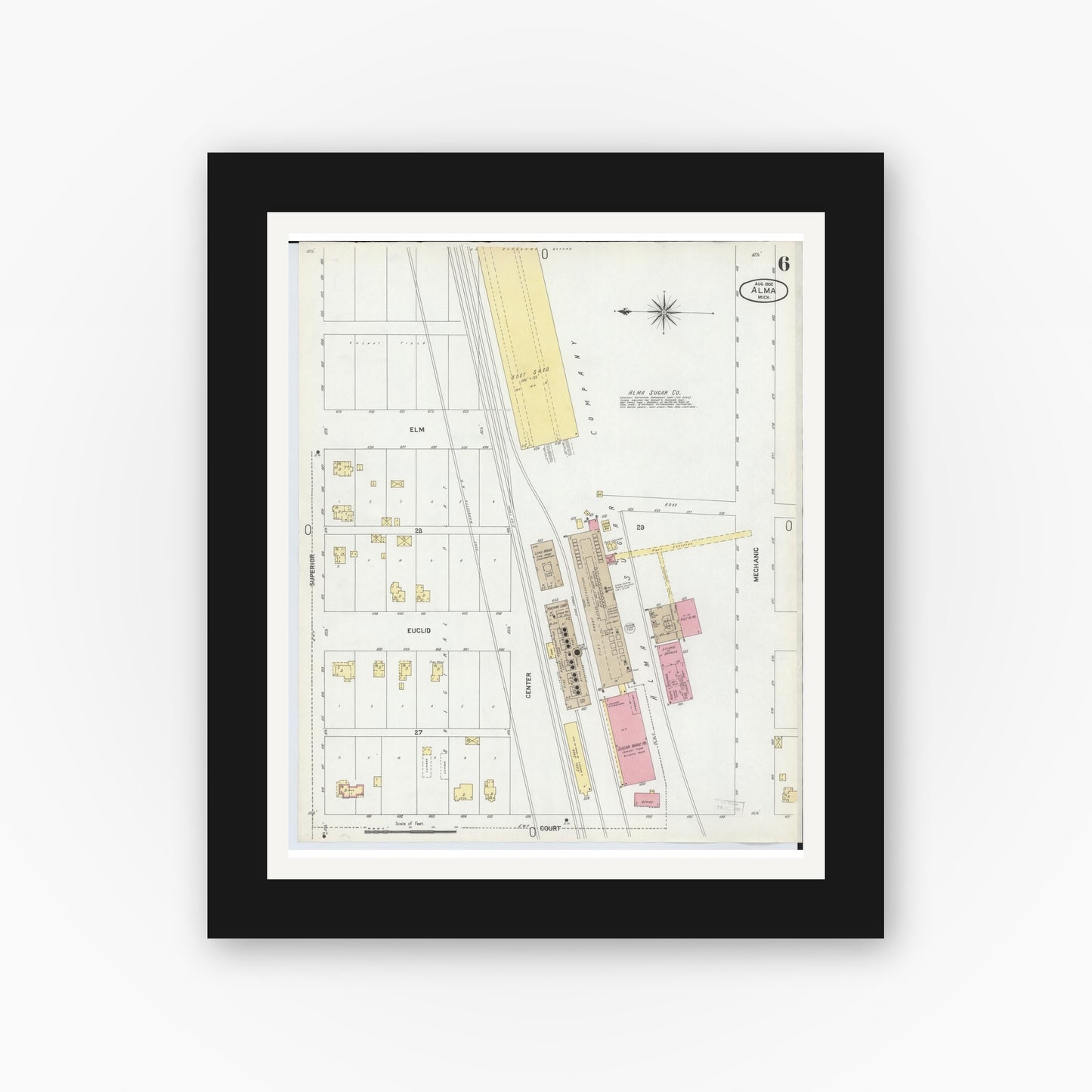Old map wall art mockup — black gallery frame with white mat — Sanborn Fire Insurance Map from Alma, Gratiot County, Michigan (1902), Sheet #0006