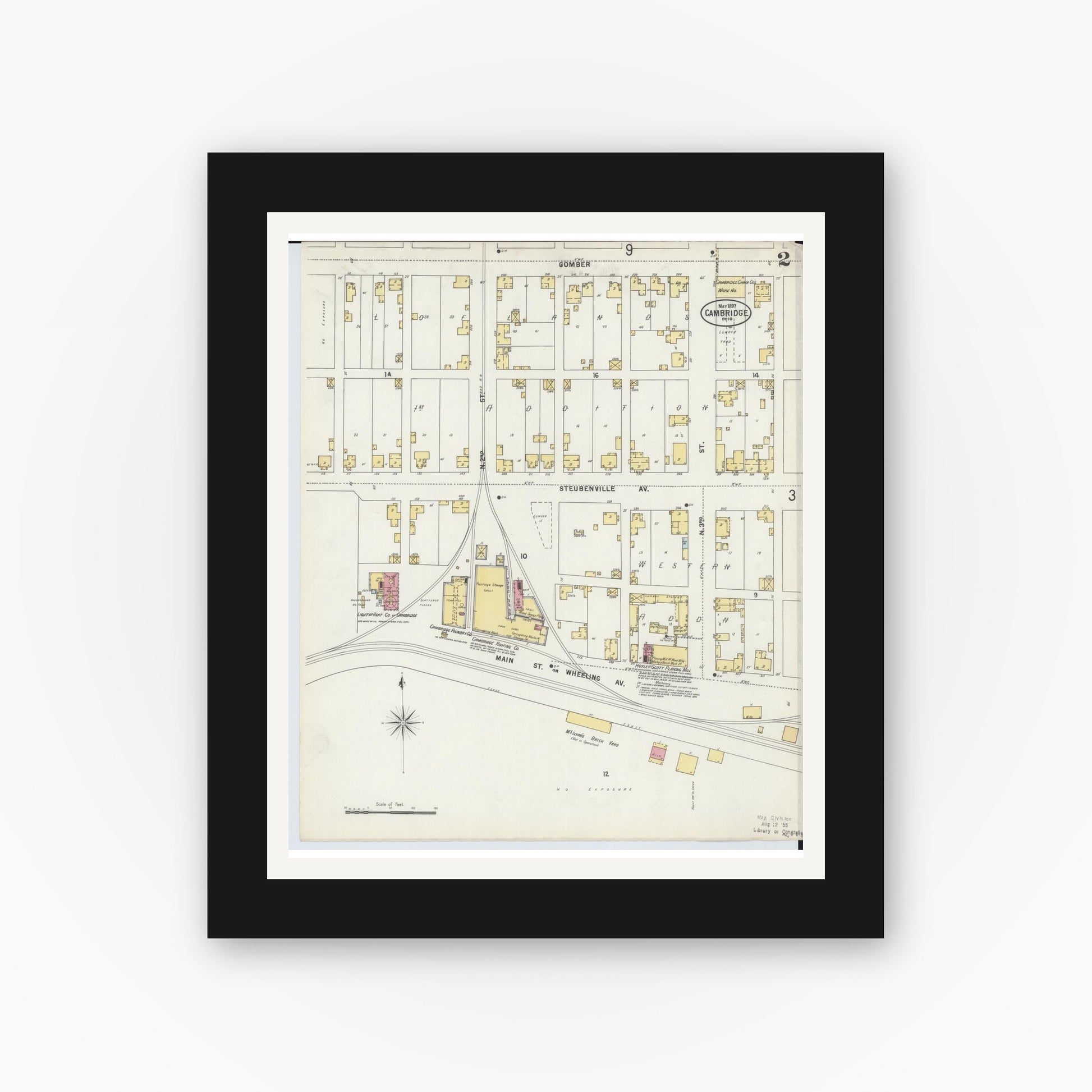 Old map wall art mockup — black gallery frame with white mat — Sanborn Fire Insurance Map from Cambridge, Guernsey County, Ohio (1897), Sheet #0002