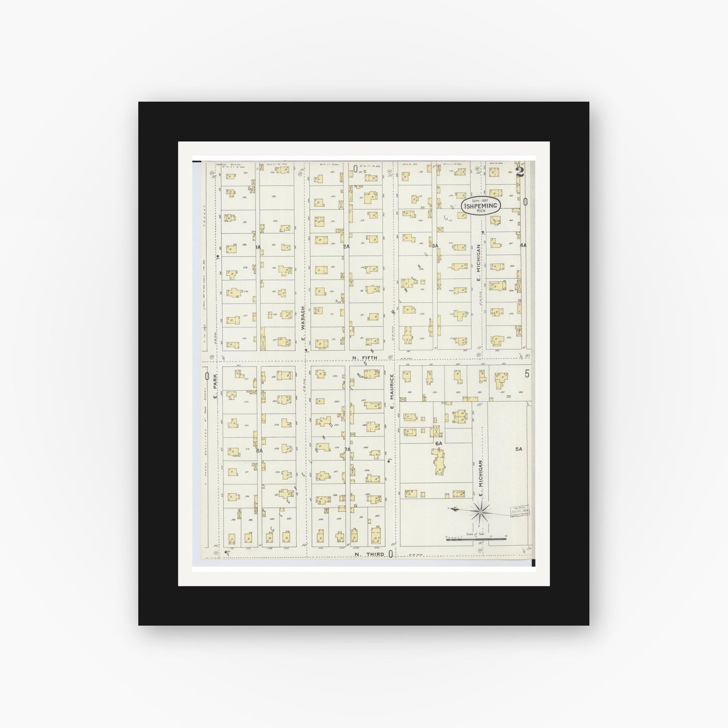 Old map wall art mockup — black gallery frame with white mat — Sanborn Fire Insurance Map from Ishpeming, Marquette County, Michigan (1897), Sheet #0002