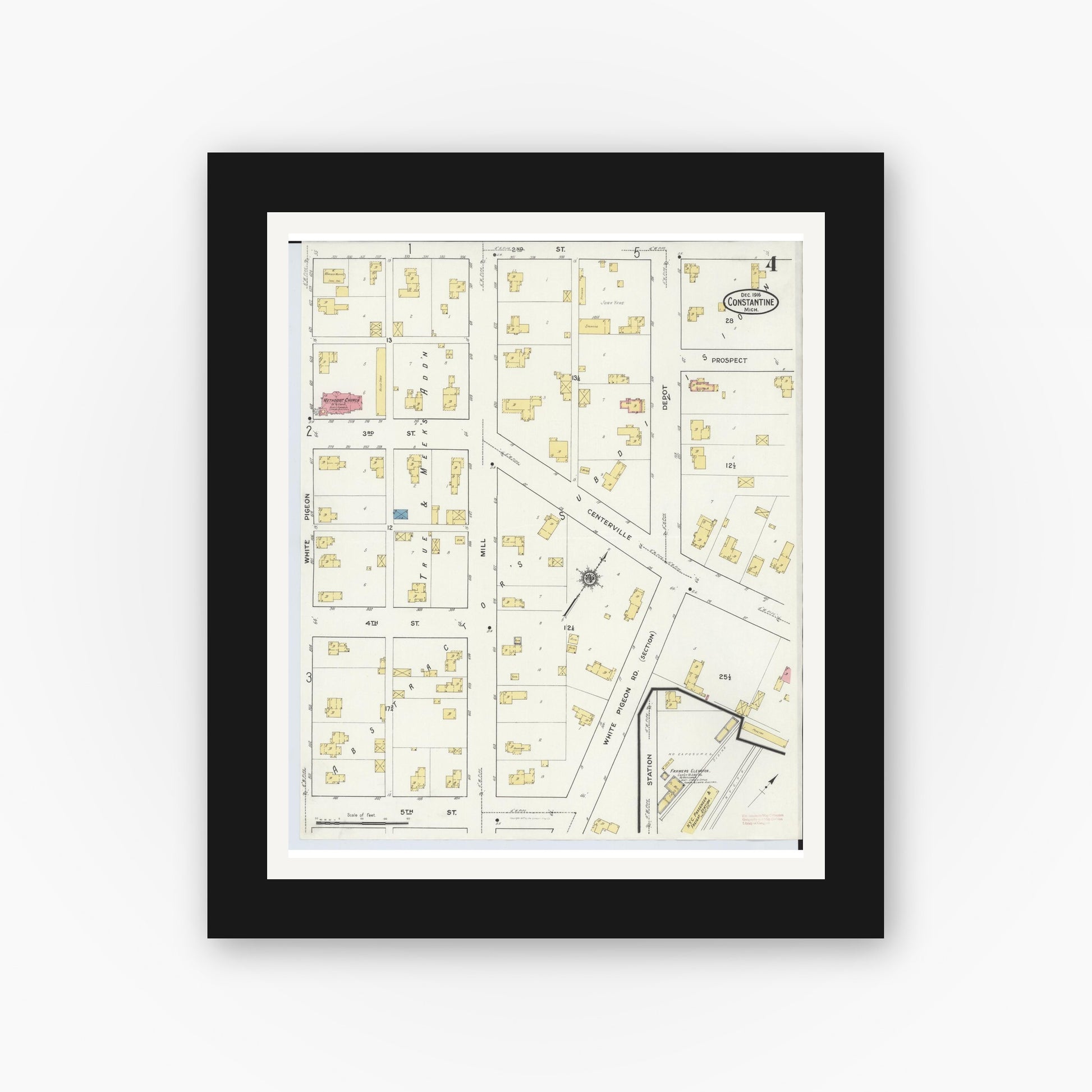 Old map wall art mockup — black gallery frame with white mat — Sanborn Fire Insurance Map from Constantine, Saint Joseph County, Michigan (1916), Sheet #0004