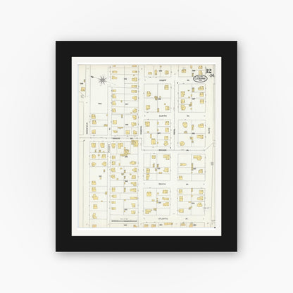Old map wall art mockup — black gallery frame with white mat — Sanborn Fire Insurance Map from Cleburne, Johnson County, Texas (1904), Sheet #0012