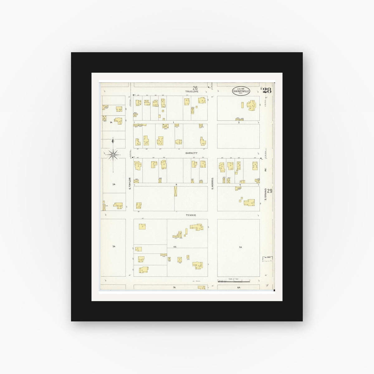Old map wall art mockup — black gallery frame with white mat — Sanborn Fire Insurance Map from Gainesville, Cooke County, Texas (1908), Sheet #0028