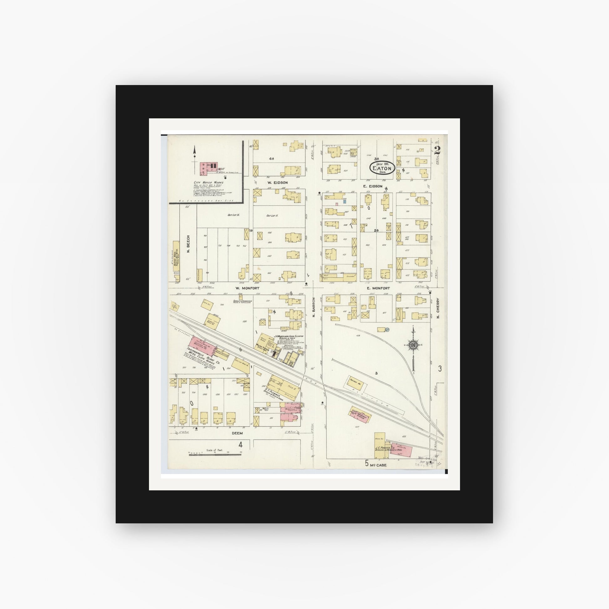 Old map wall art mockup — black gallery frame with white mat — Sanborn Fire Insurance Map from Eaton, Preble County, Ohio (1911), Sheet #0002