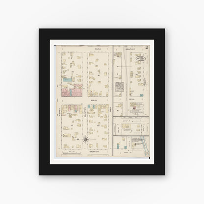 Old map wall art mockup — black gallery frame with white mat — Sanborn Fire Insurance Map from Ovid, Clinton County, Michigan (1884), Sheet #0002