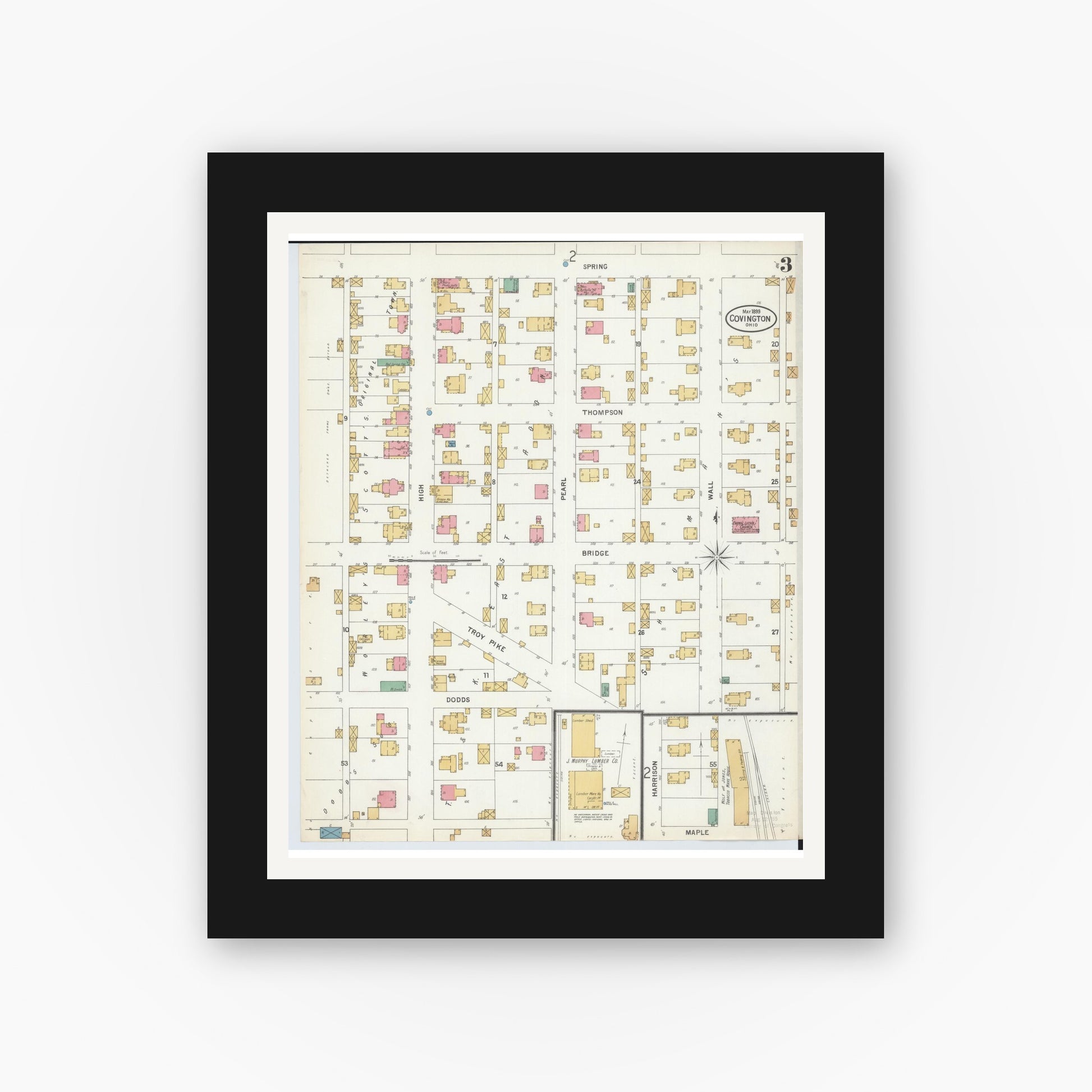 Old map wall art mockup — black gallery frame with white mat — Sanborn Fire Insurance Map from Covington, Miami County, Ohio (1899), Sheet #0003