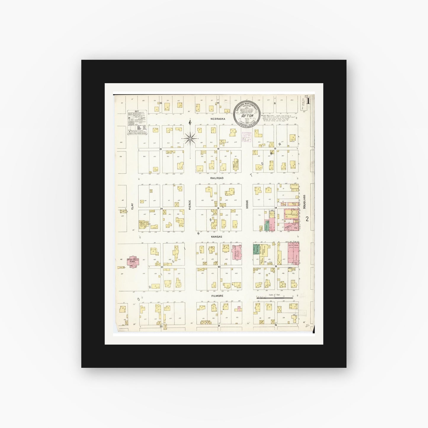 Old map wall art mockup — black gallery frame with white mat — Sanborn Fire Insurance Map from Afton, Union County, Iowa (1907) â€” Complete Set