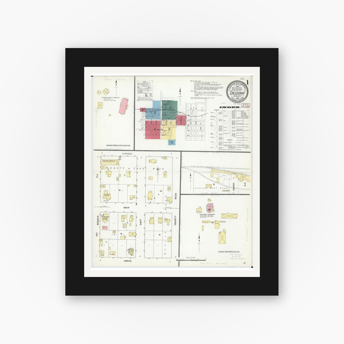 Old map wall art mockup — black gallery frame with white mat — Sanborn Fire Insurance Map from Caledonia, Houston County, Minnesota (1909) - Complete Map Set