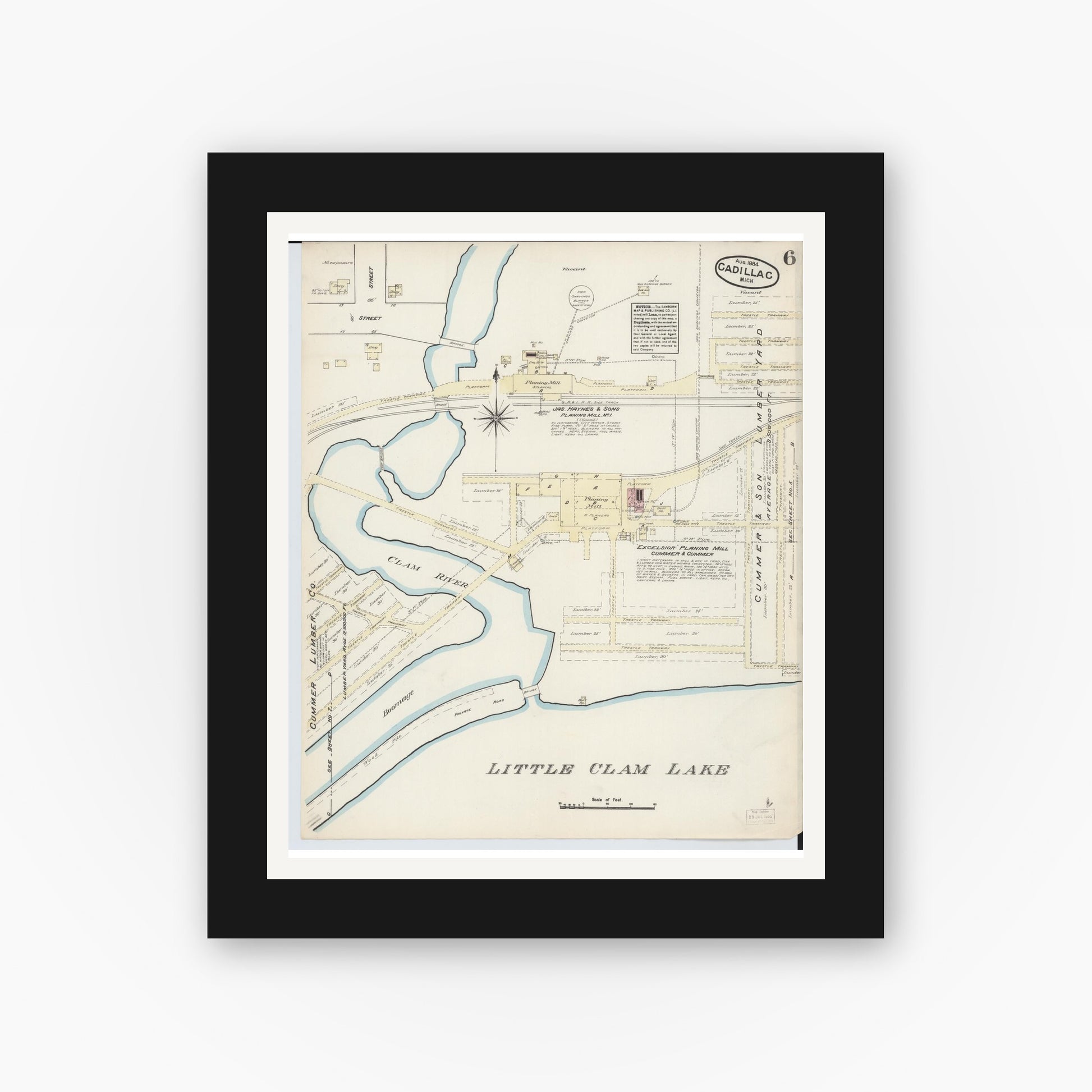 Old map wall art mockup — black gallery frame with white mat — Sanborn Fire Insurance Map from Cadillac, Wexford County, Michigan (1884), Sheet #0006