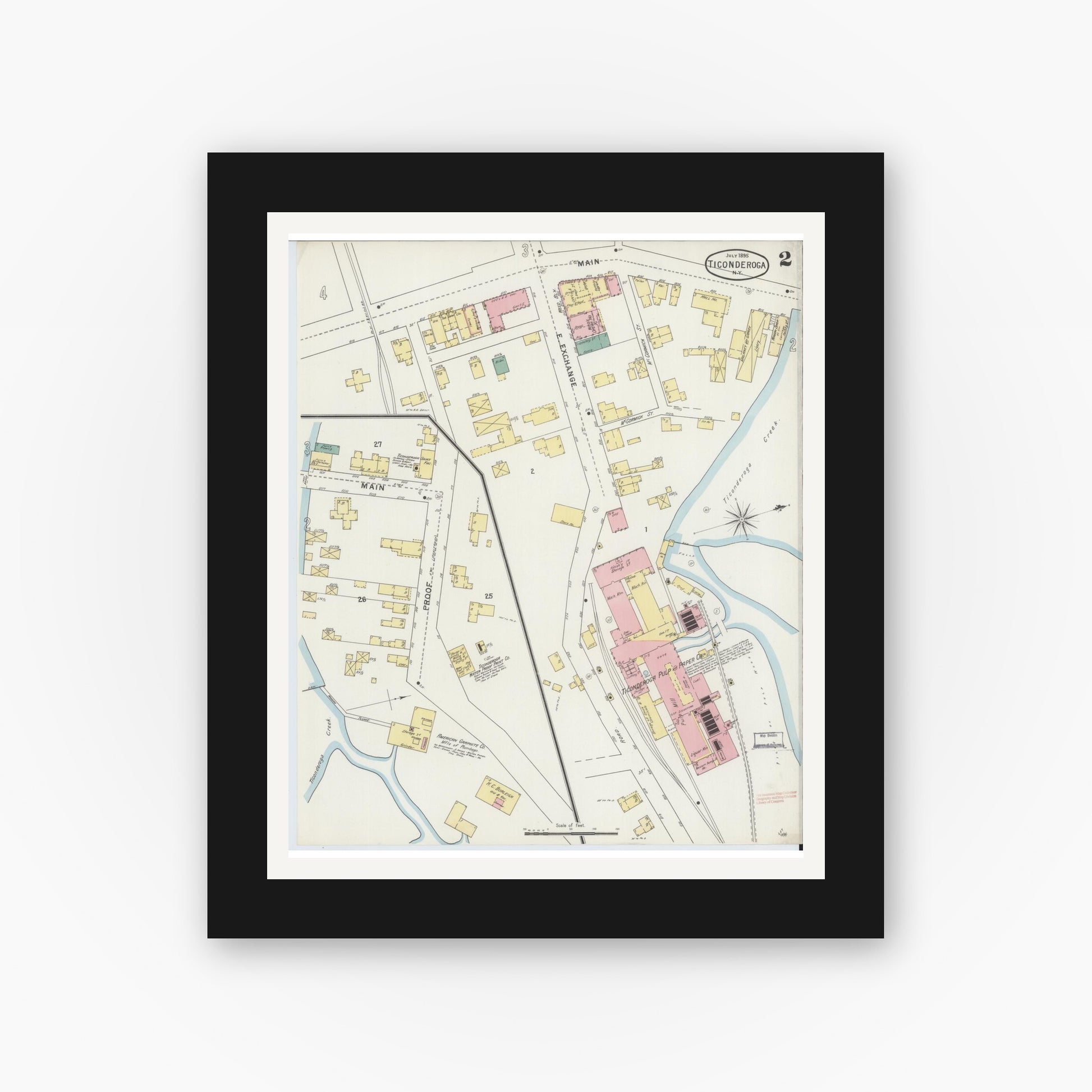 Old map wall art mockup — black gallery frame with white mat — Sanborn Fire Insurance Map from Ticonderoga, Essex County, New York (1895), Sheet #0002