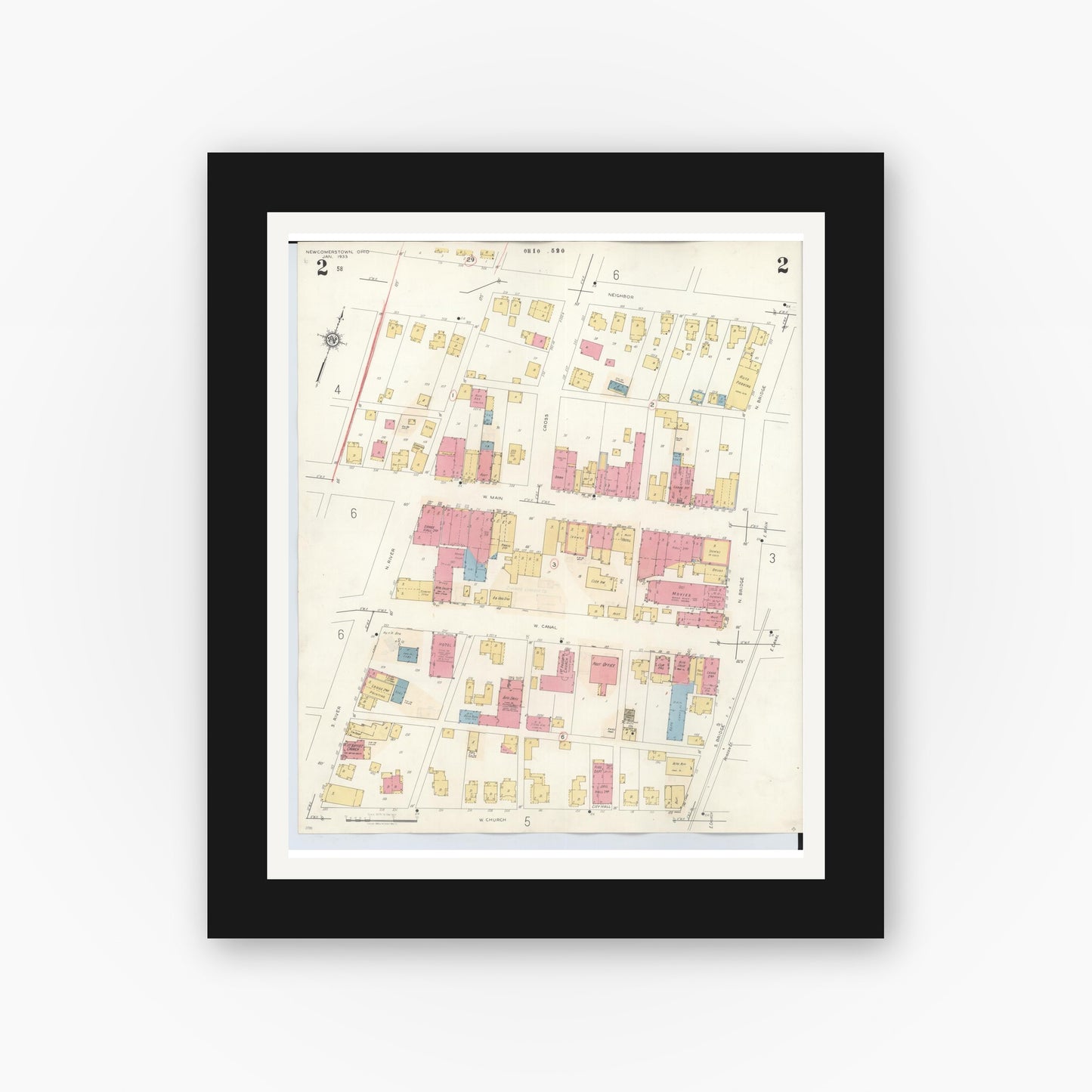 Old map wall art mockup — black gallery frame with white mat — Sanborn Fire Insurance Map from Newcomerstown, Tuscarawas County, Ohio (1933), Sheet #0002