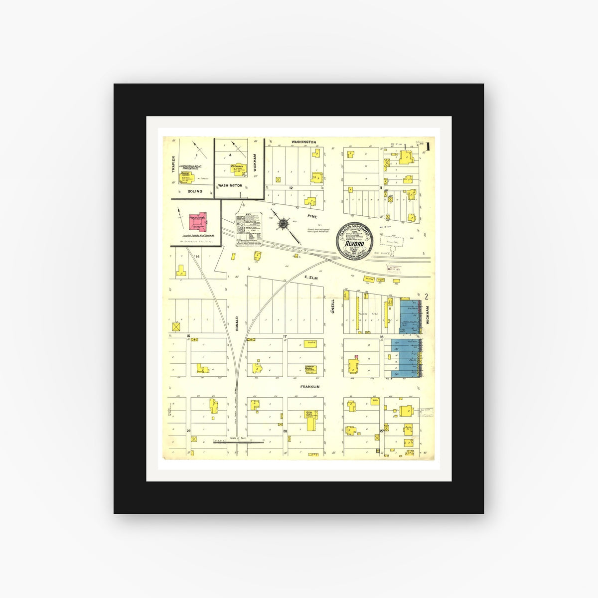 Old map wall art mockup — black gallery frame with white mat — Sanborn Fire Insurance Map from Alvord, Wise County, Texas (1911), Sheet #0001