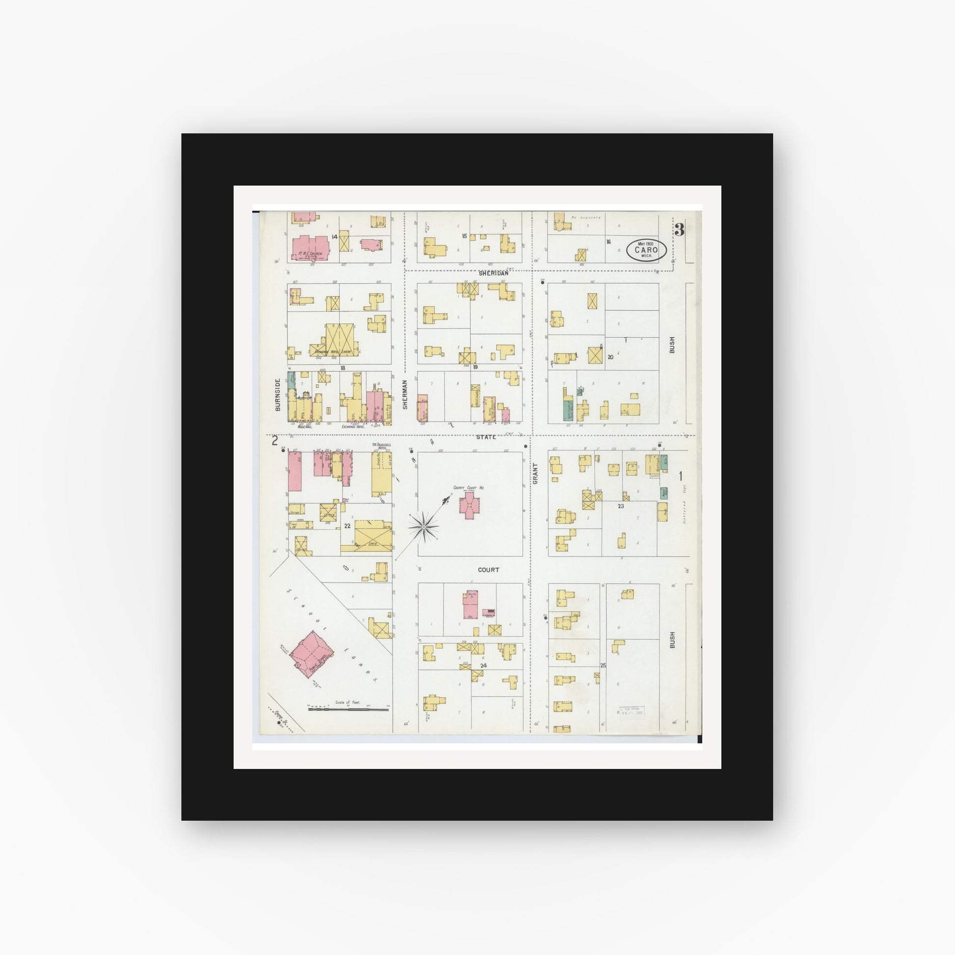 Old map wall art mockup — black gallery frame with white mat — Sanborn Fire Insurance Map from Caro, Tuscola County, Michigan (1900), Sheet #0003