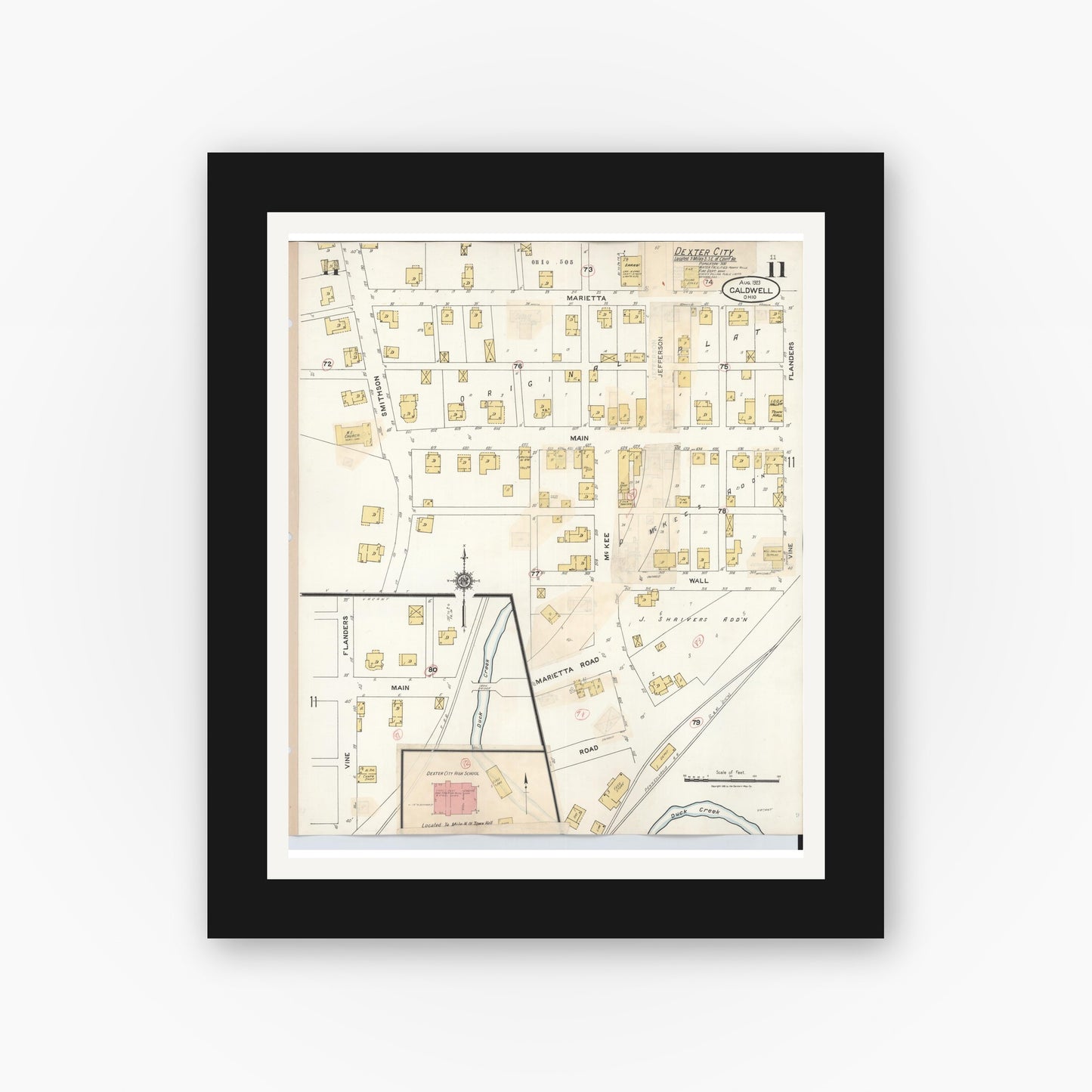 Old map wall art mockup — black gallery frame with white mat — Sanborn Fire Insurance Map from Caldwell, Noble County, Ohio (1932), Sheet #0011