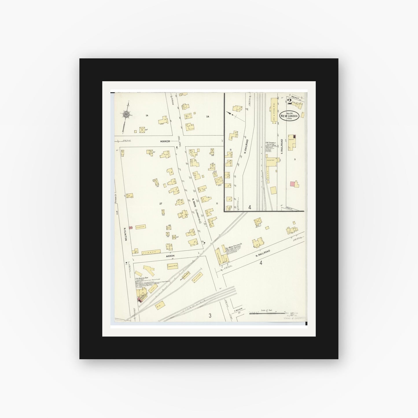 Old map wall art mockup — black gallery frame with white mat — Sanborn Fire Insurance Map from New London, Huron County, Ohio (1911), Sheet #0002