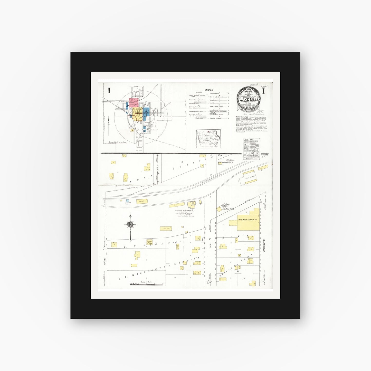 Old map wall art mockup — black gallery frame with white mat — Sanborn Fire Insurance Map from Lake Mills, Winnebago County, Iowa (1923) â€” Complete Set