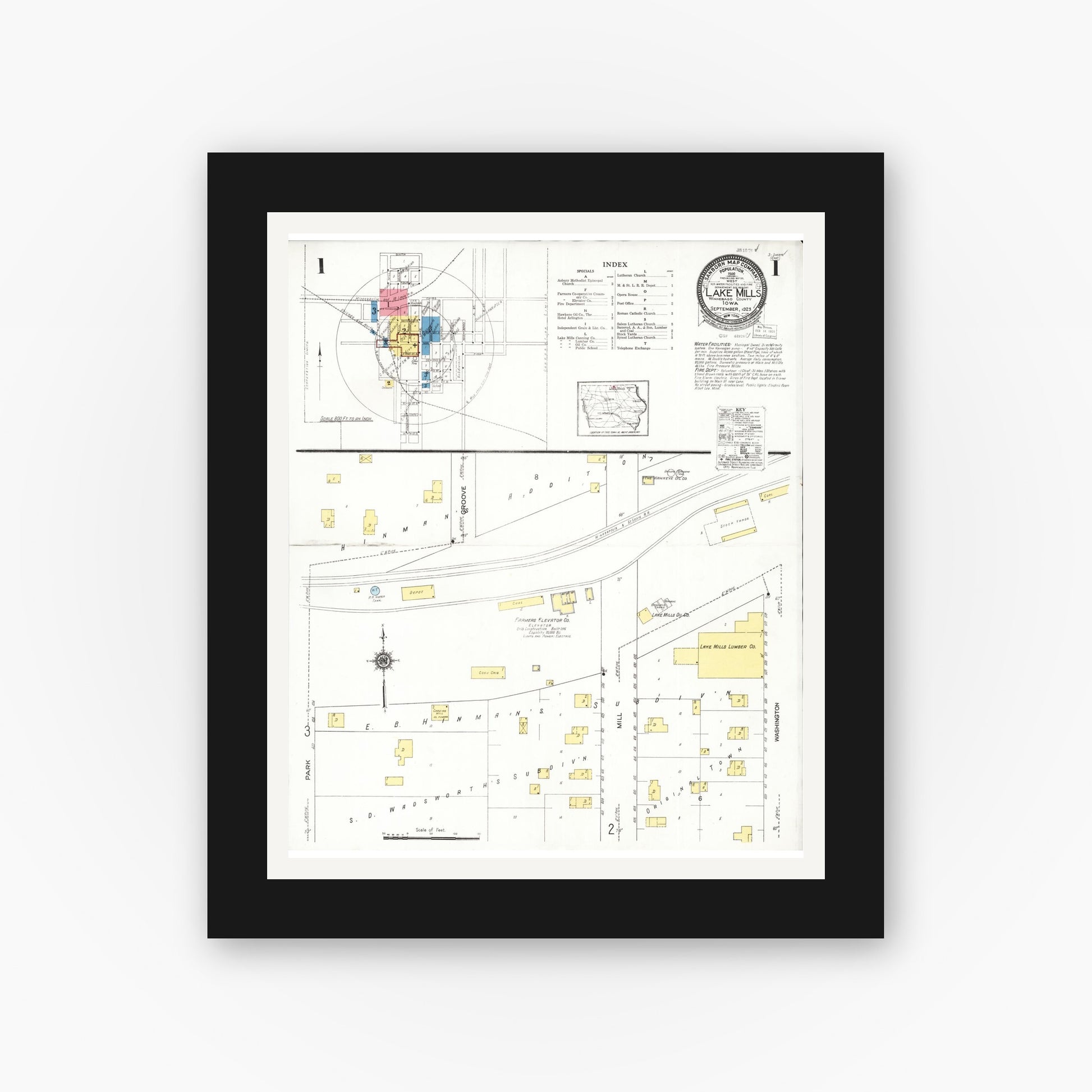 Old map wall art mockup — black gallery frame with white mat — Sanborn Fire Insurance Map from Lake Mills, Winnebago County, Iowa (1923) â€” Complete Set