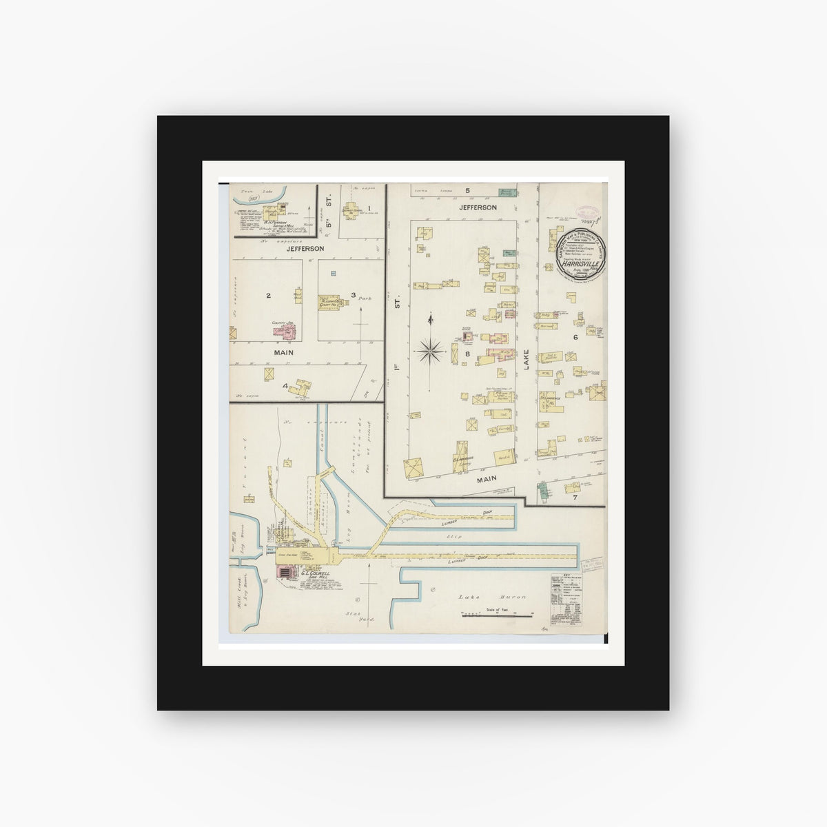 Old map wall art mockup — black gallery frame with white mat — Sanborn Fire Insurance Map from Harrisville, Alcona County, Michigan (1887), Sheet #0001