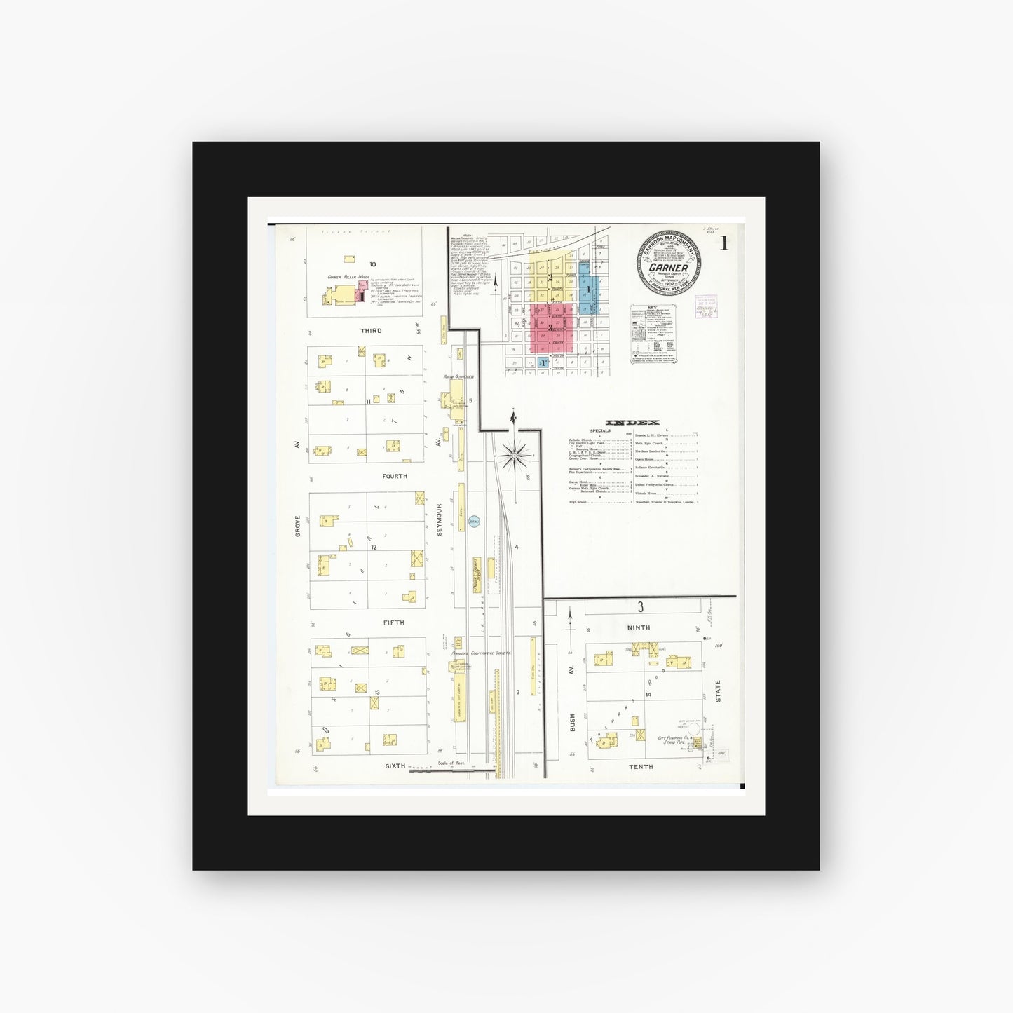 Old map wall art mockup — black gallery frame with white mat — Sanborn Fire Insurance Map from Garner, Hancock County, Iowa (1907) â€” Complete Set
